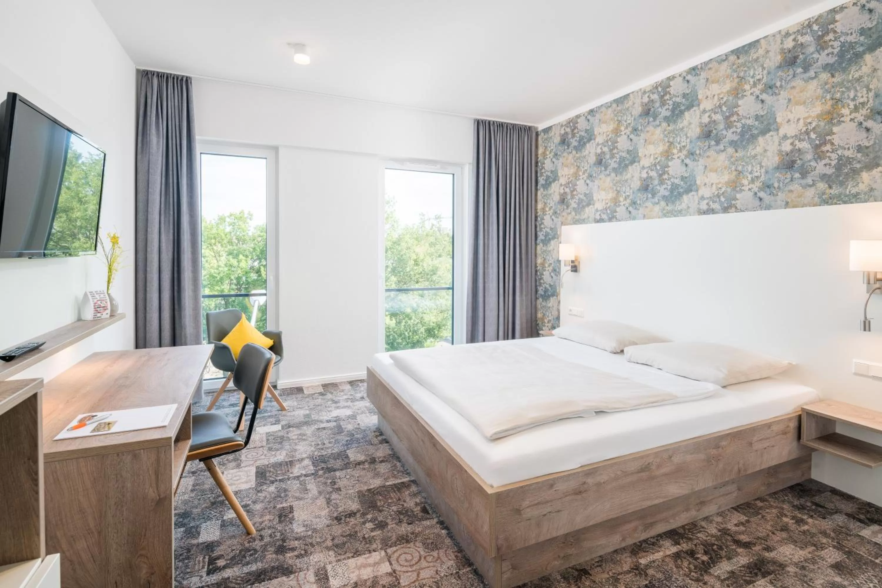 Bed in Stadthotel Lohne, Self Check In, mit Bäckerei und Cafe