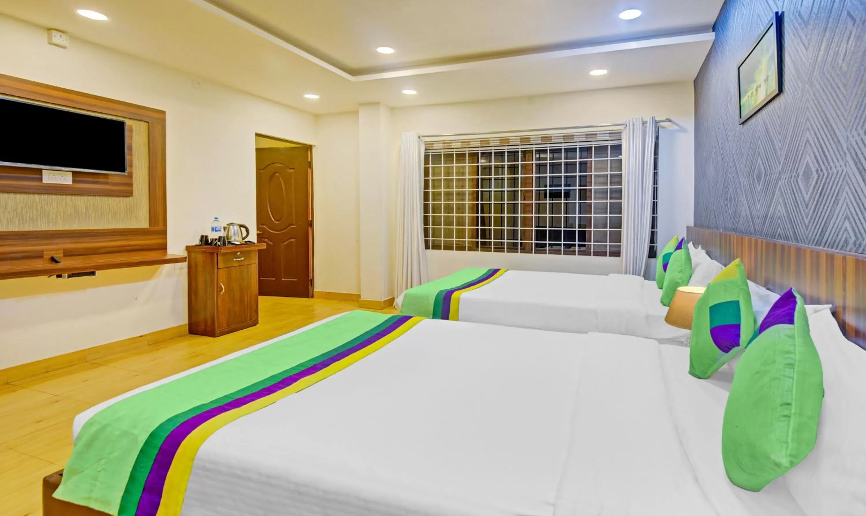 Bedroom in Itsy Hotels Igloo Residency, 400 Meters From Raja Seat Garden