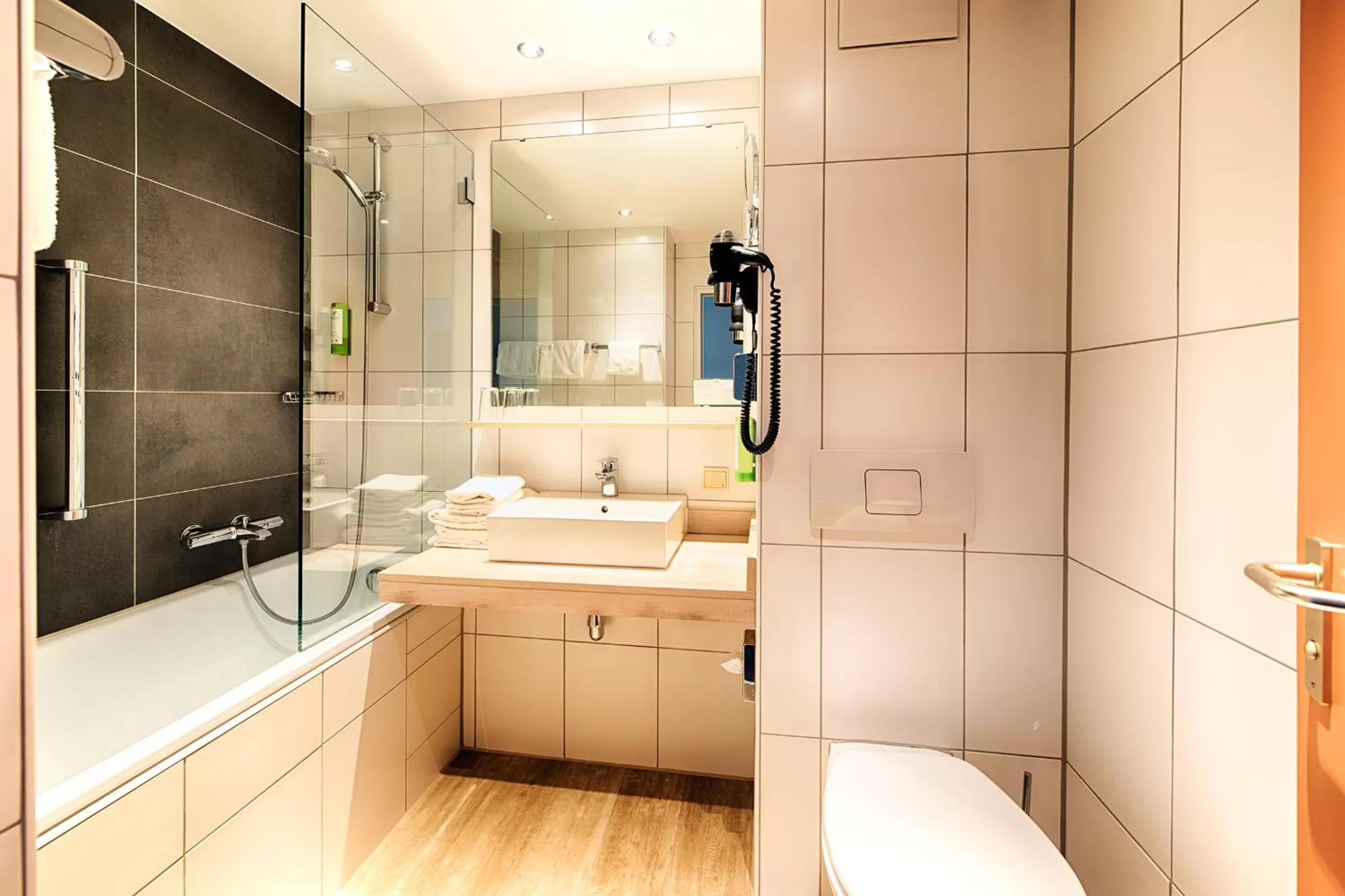 Bathroom in Holiday Inn Munich - South by IHG