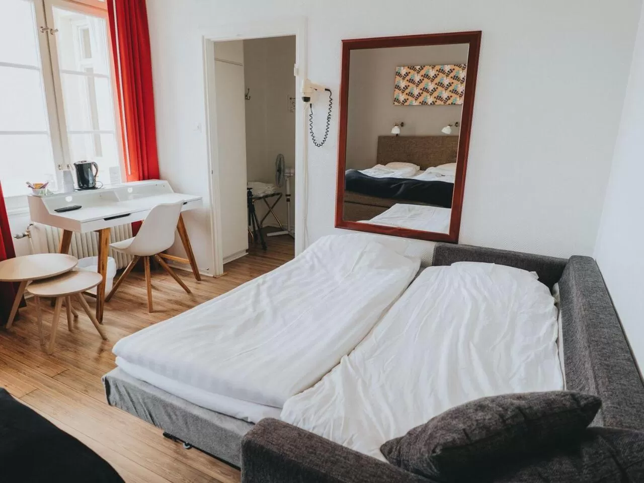 Photo of the whole room, Bed in Arboga Stadshotell