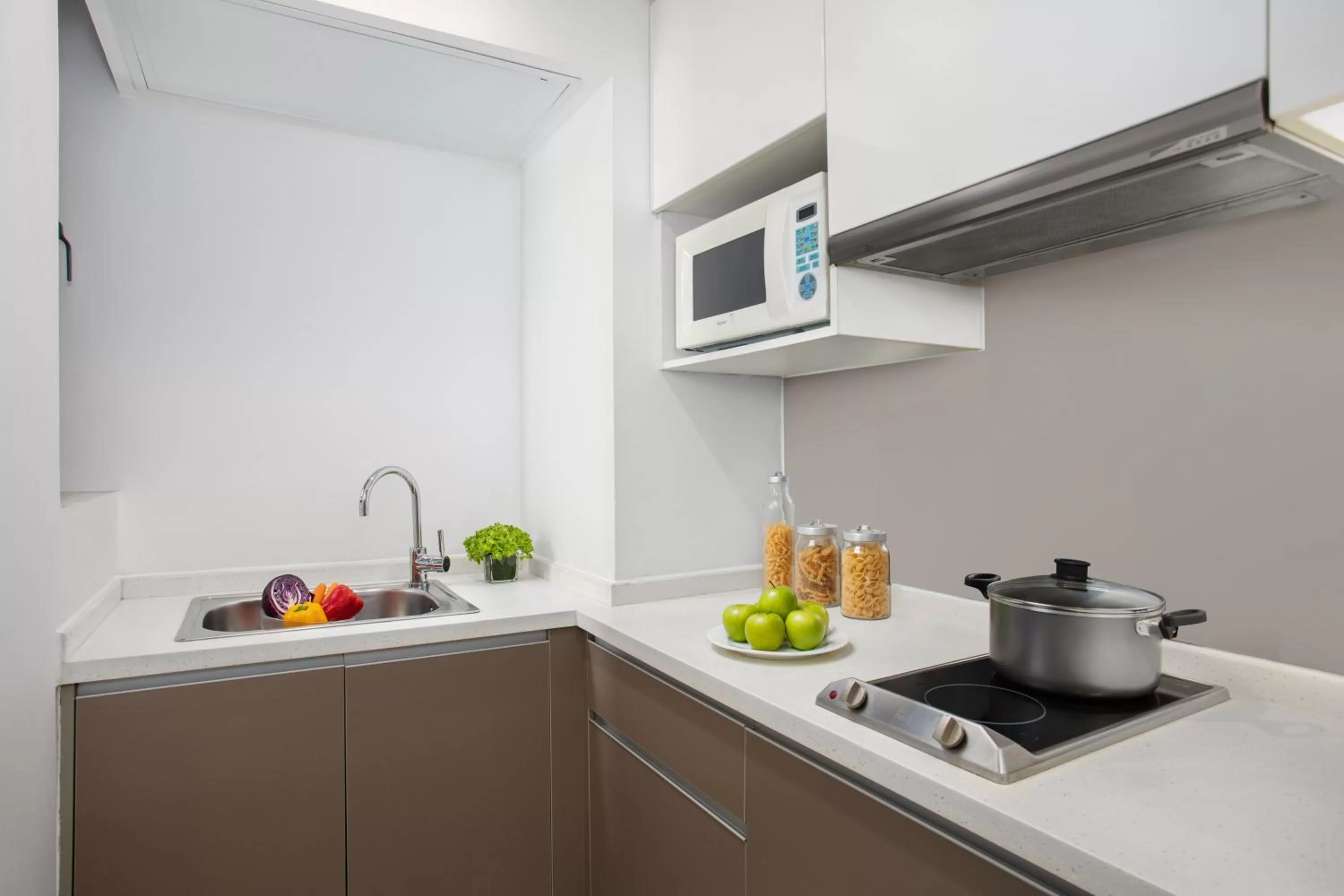 Kitchen or kitchenette in Citadines Xinghai Suzhou