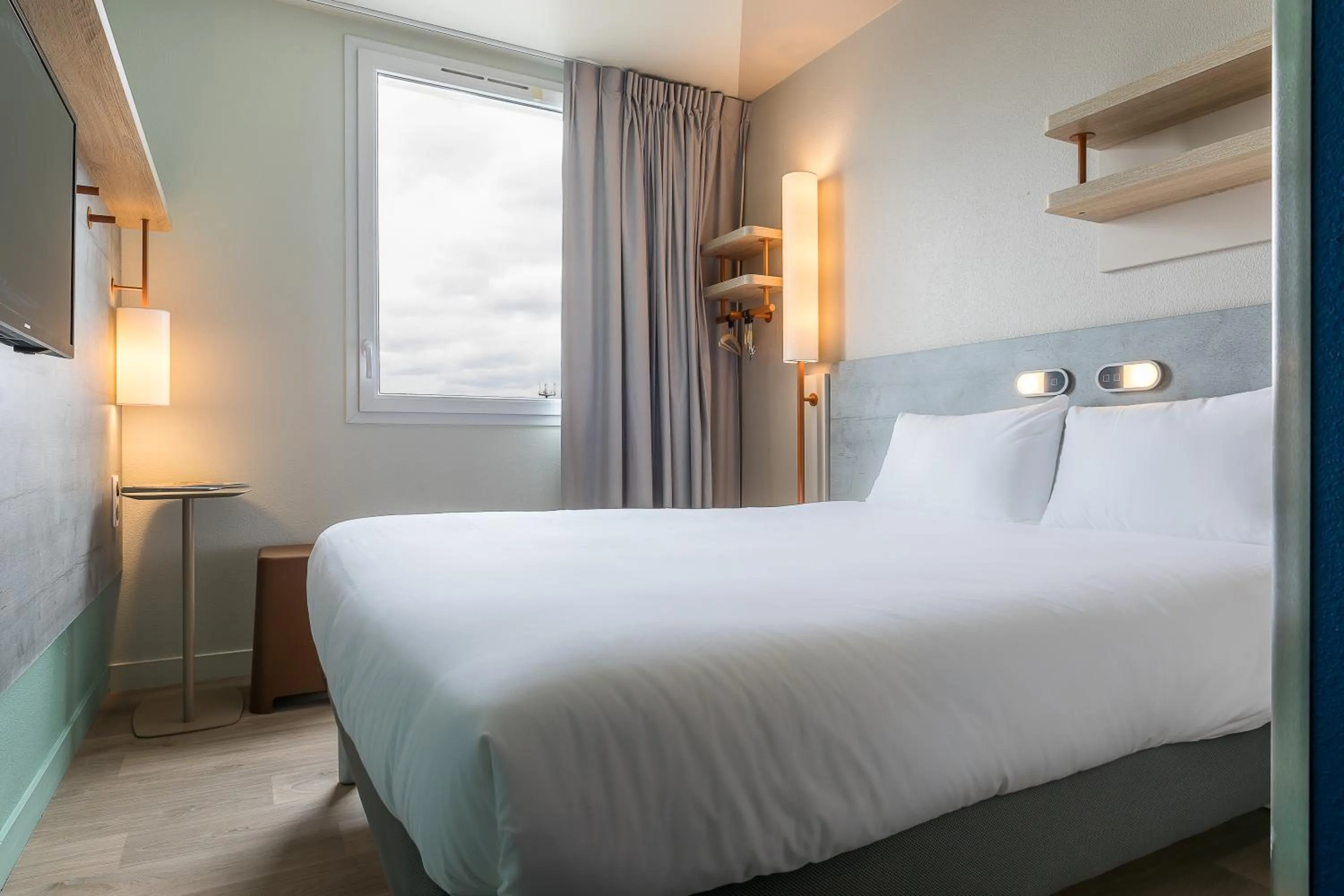 Bed in ibis budget Paris Gennevilliers