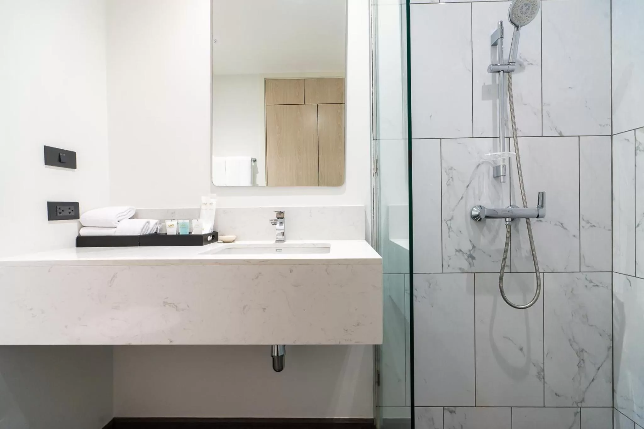 Bathroom in One Patio Hotel Pattaya - SHA Extra Plus