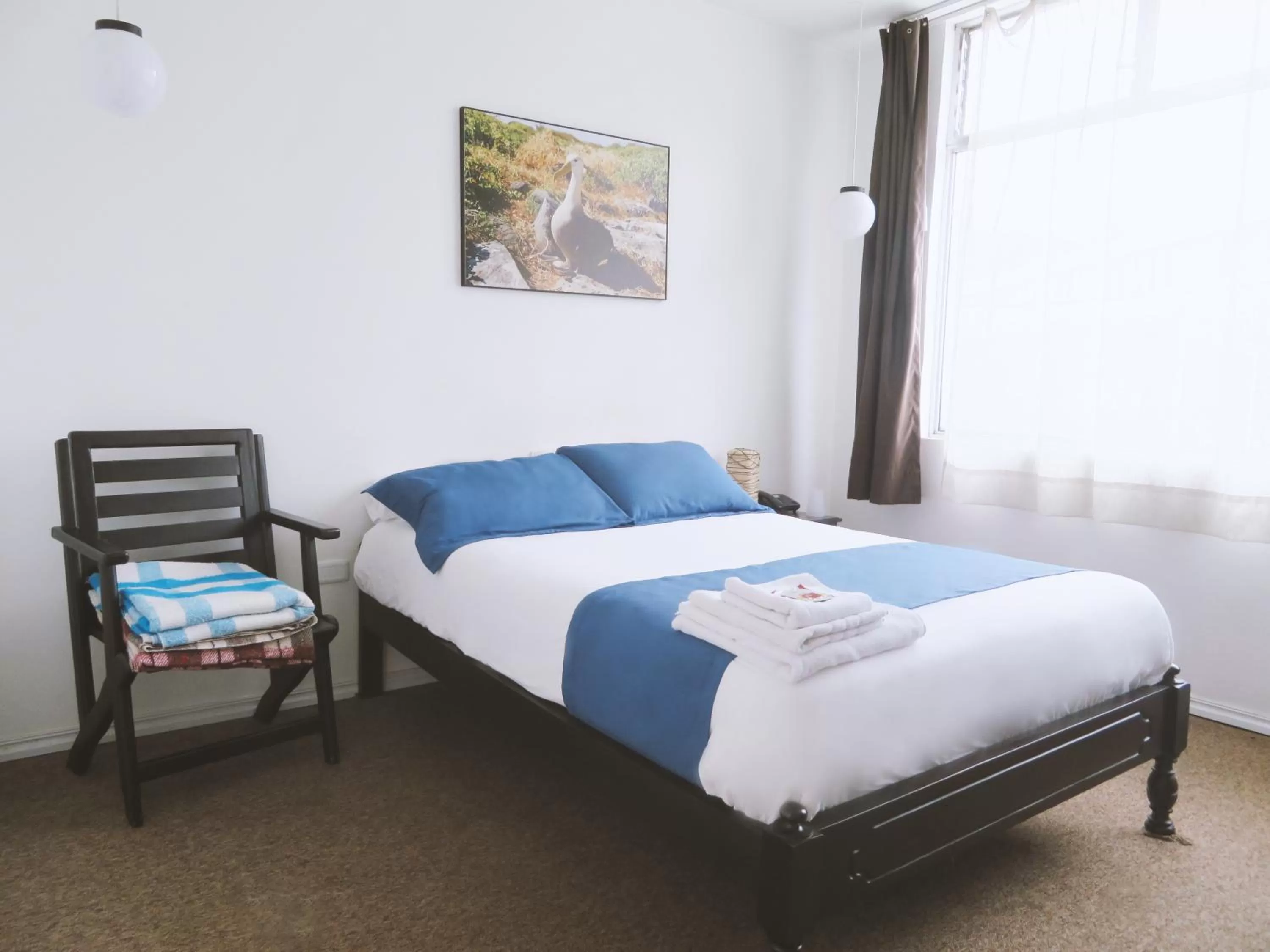 Bed in Bird Garden Guest House