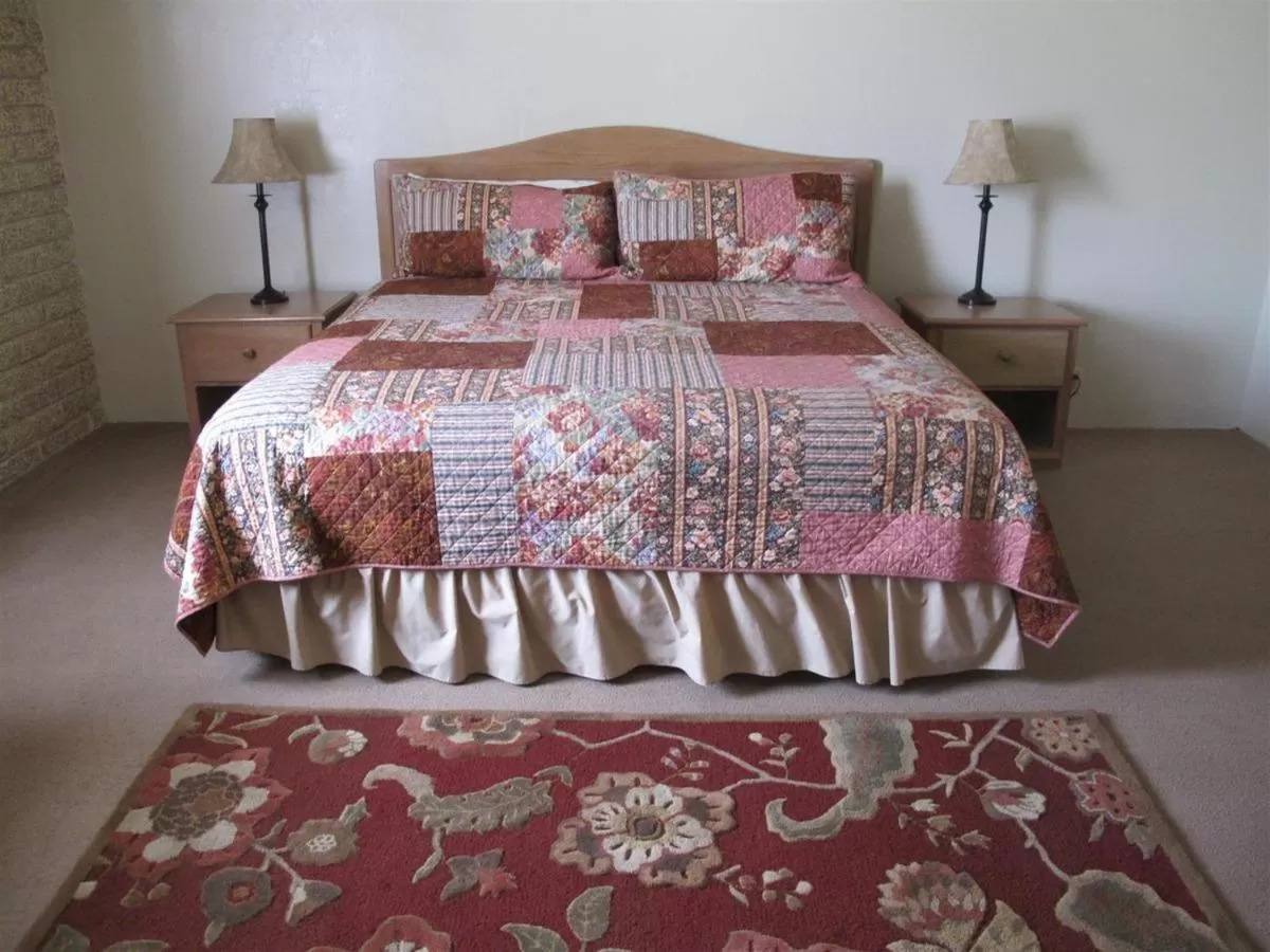 Bed in Stage Stop Inn