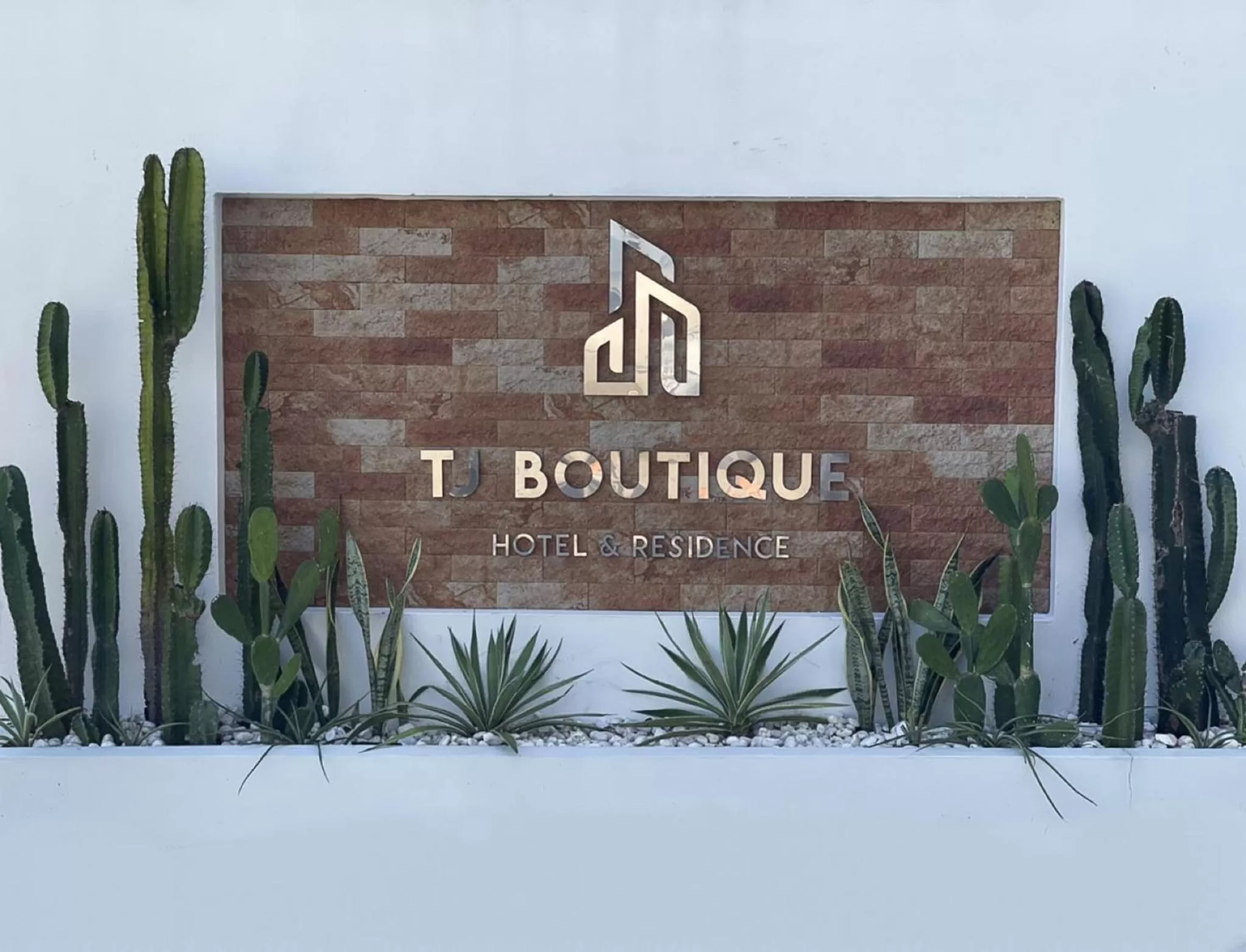 Property logo or sign in TJ Boutique Hotel