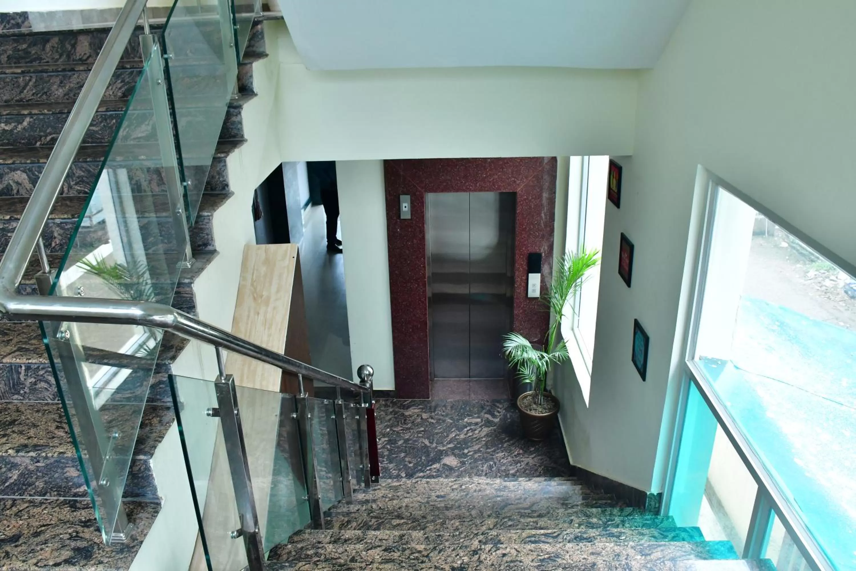 elevator in Hotel Yatharth Inn