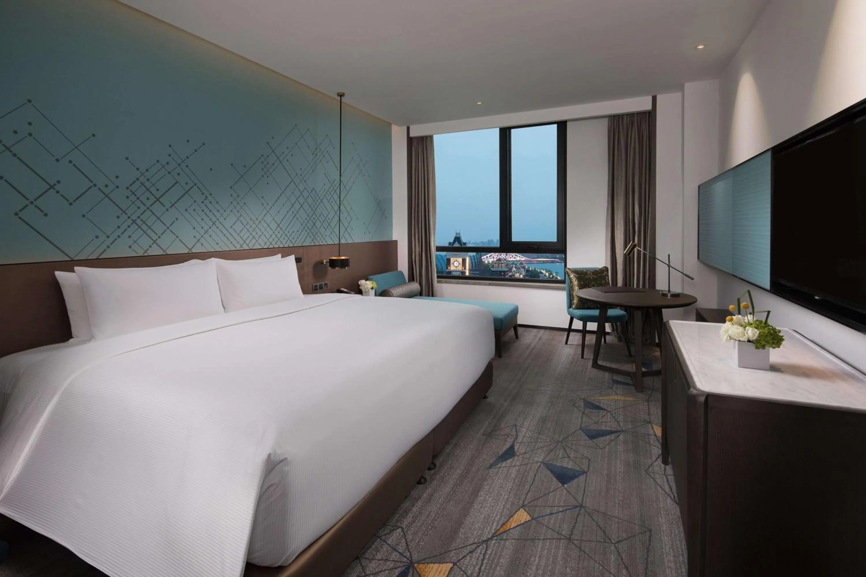 Property building, Bed in Doubletree By Hilton Qingdao Oriental Movie Metropolis