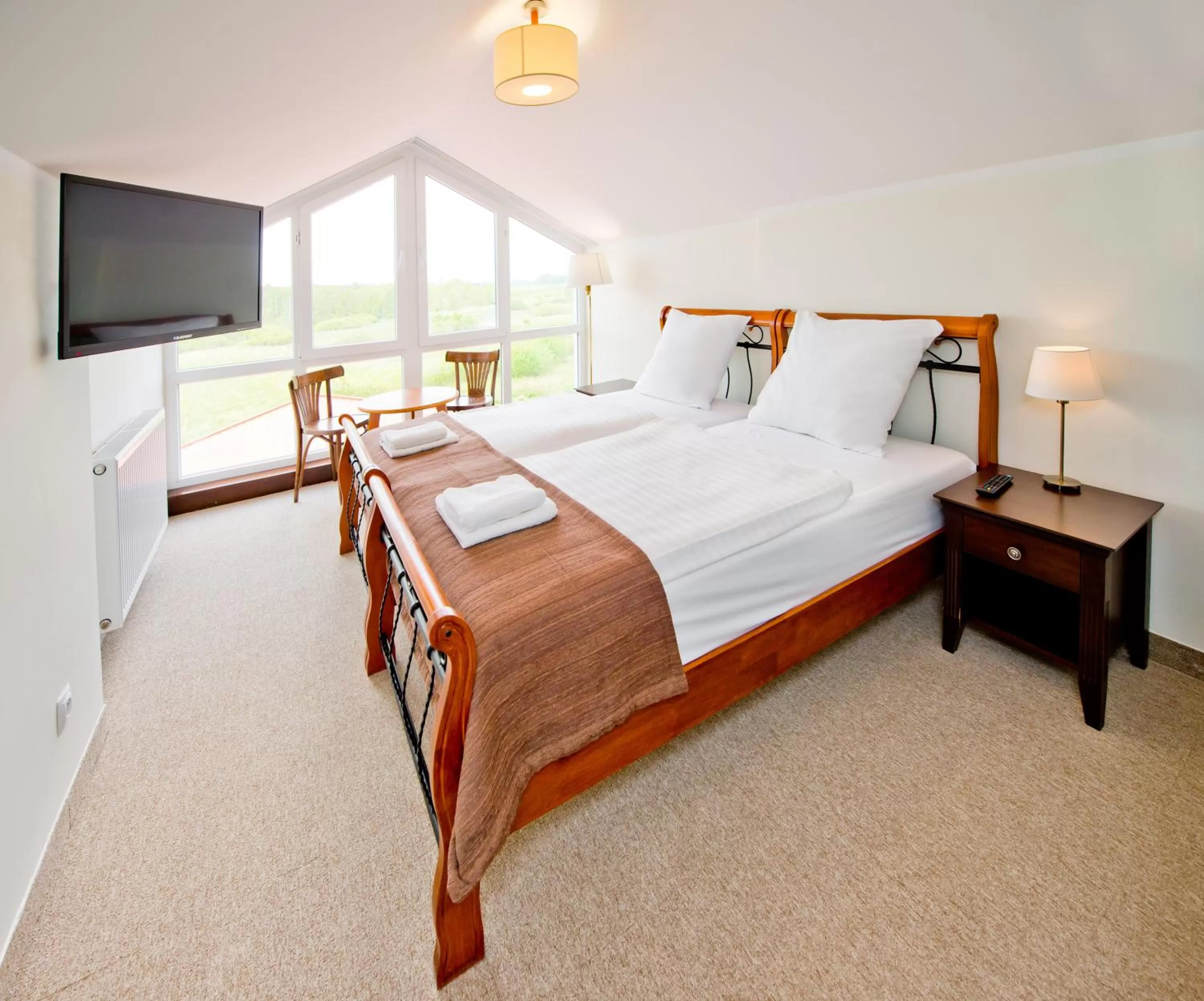 Bed in Hotel Mona Lisa Wellness & Spa