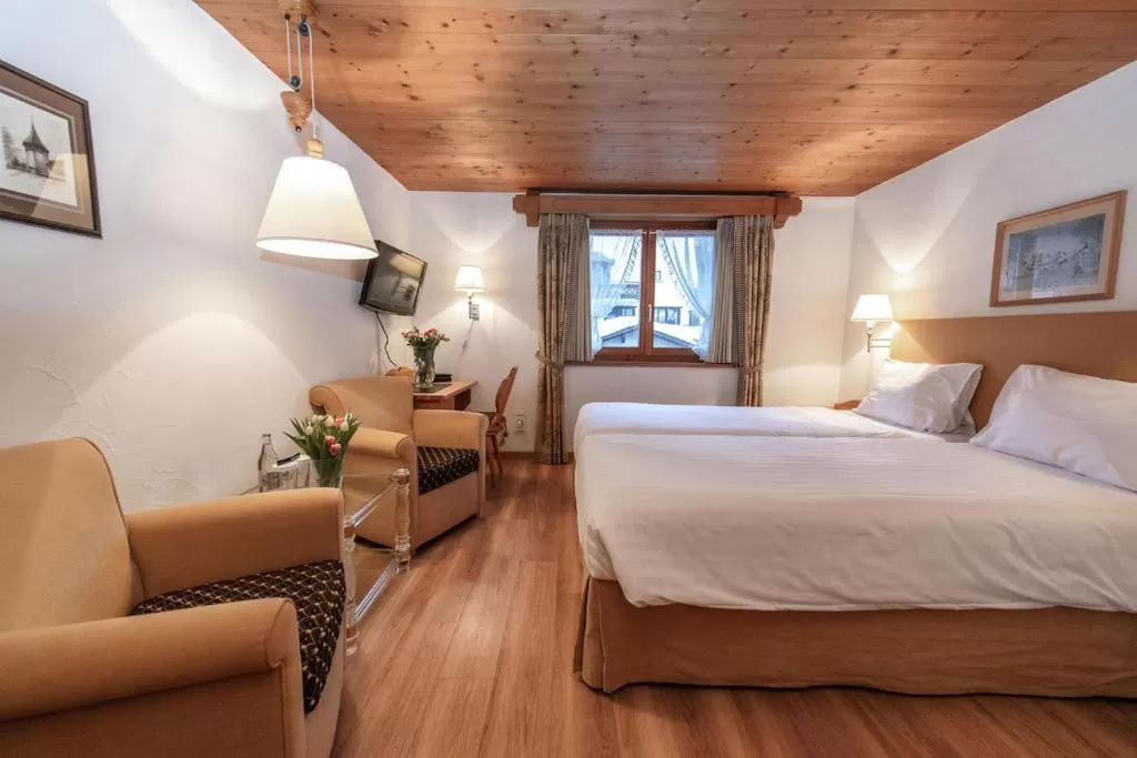 Bed in Hotel Steinbock