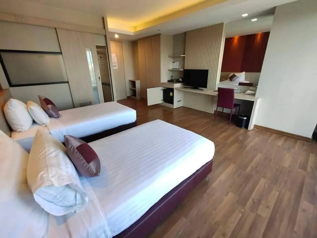 Bed in Tonaoi Grand Hotel