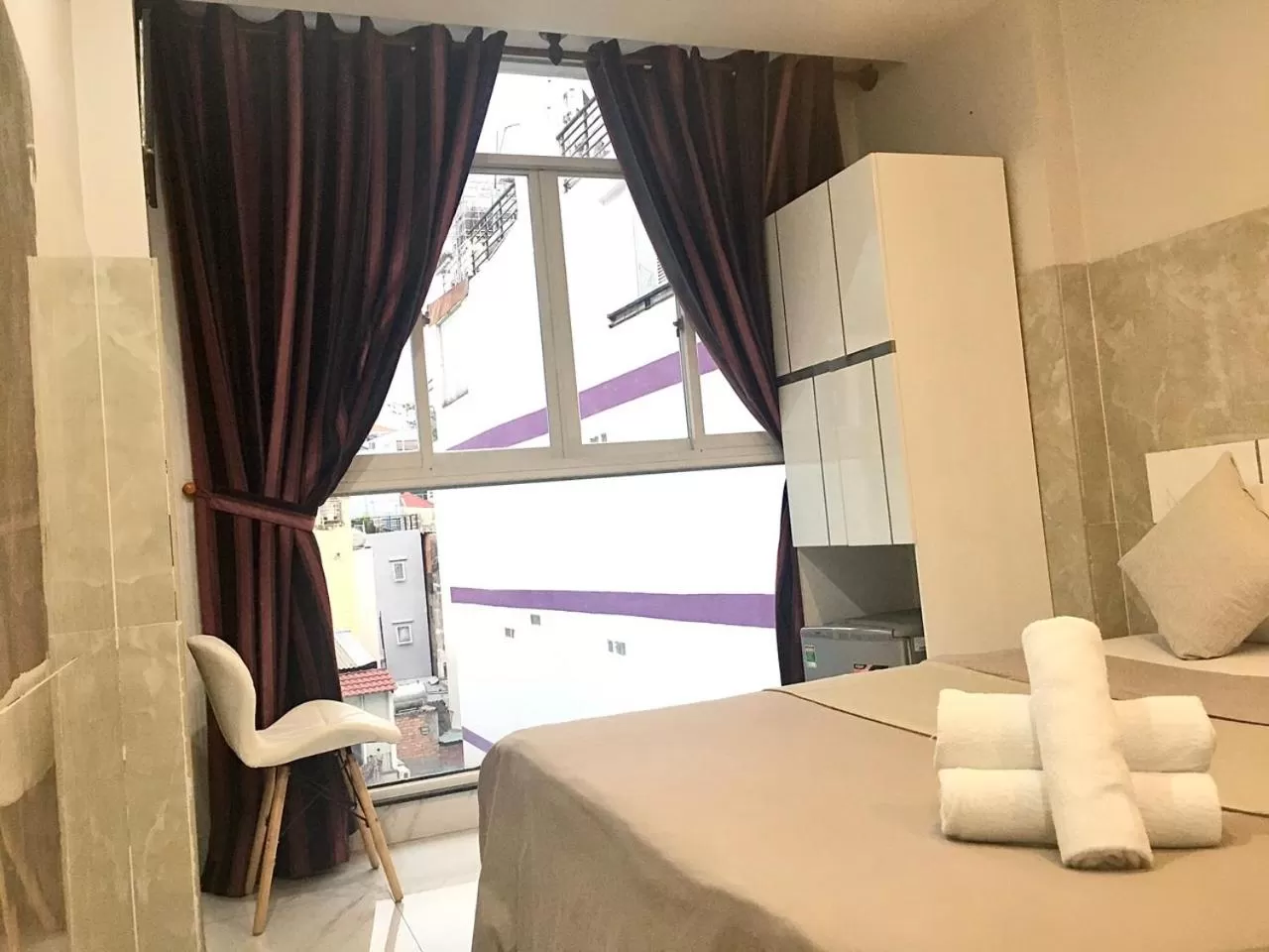 Bed in SaiGon CoZy Hotel "241 Pham Ngu Lao Street''