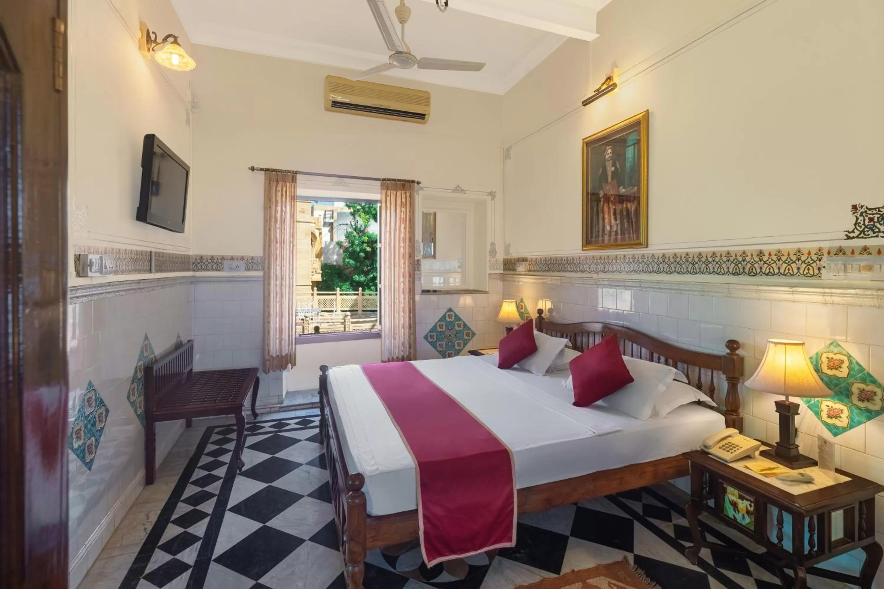 Bed in WelcomHeritage Mandir Palace