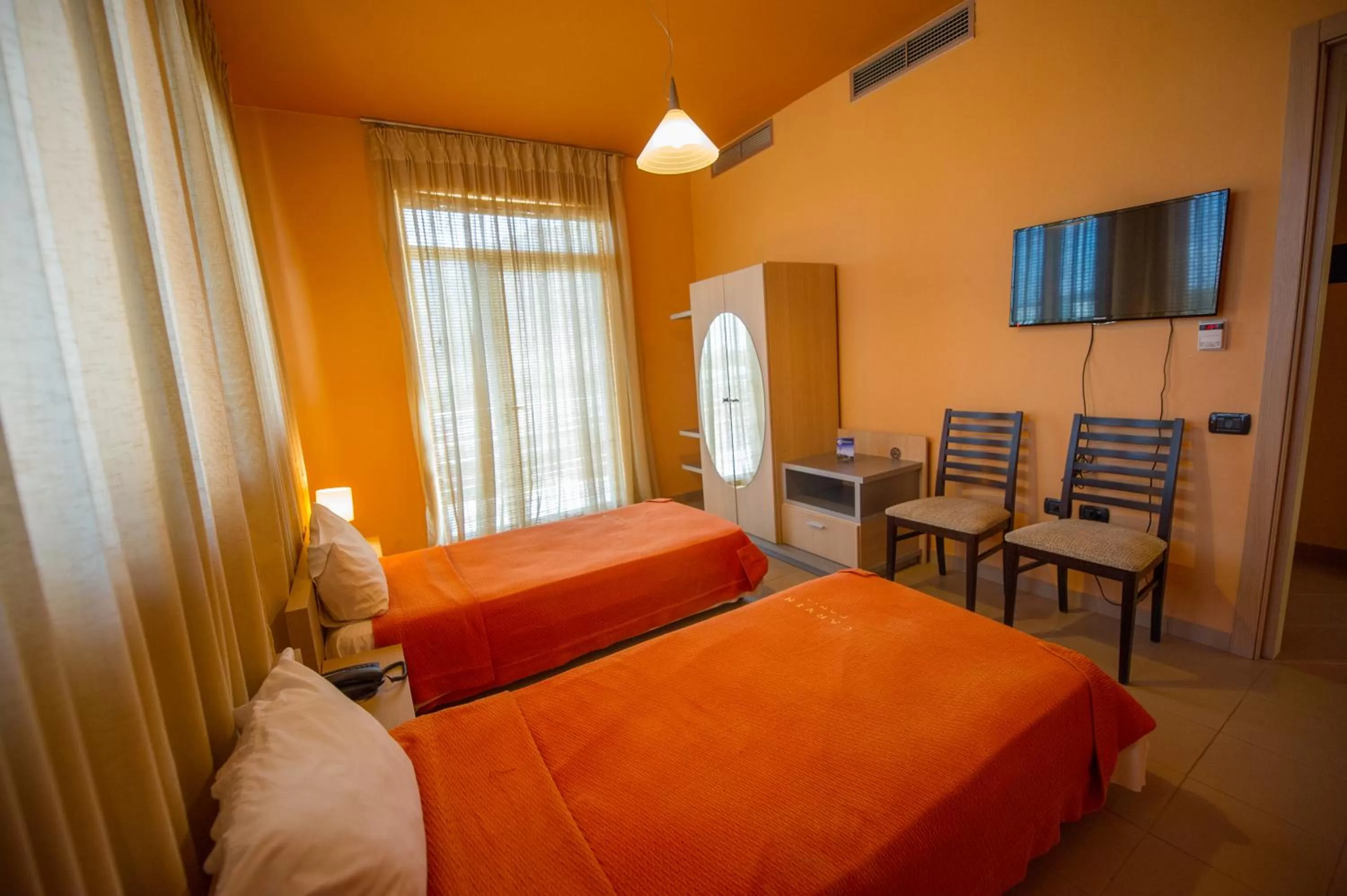 Bedroom, Room Photo in Luani A Hotel