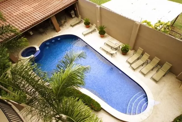 Day, Pool View in Monaco Condominiums