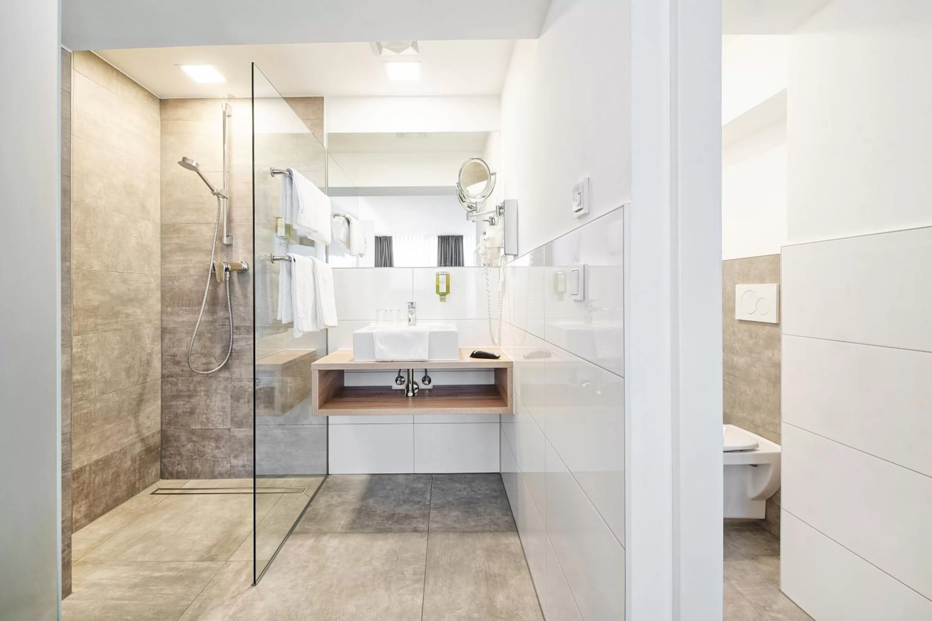 Bathroom in Hotel 24 Checkin Velden