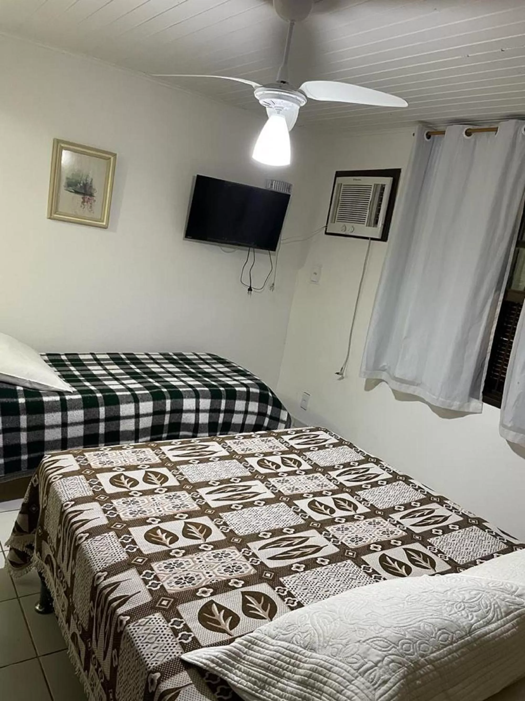 Bed in Pousada Saint Germain