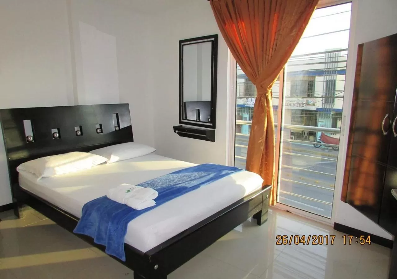 Bed in Hotel Palmeras De Mariana