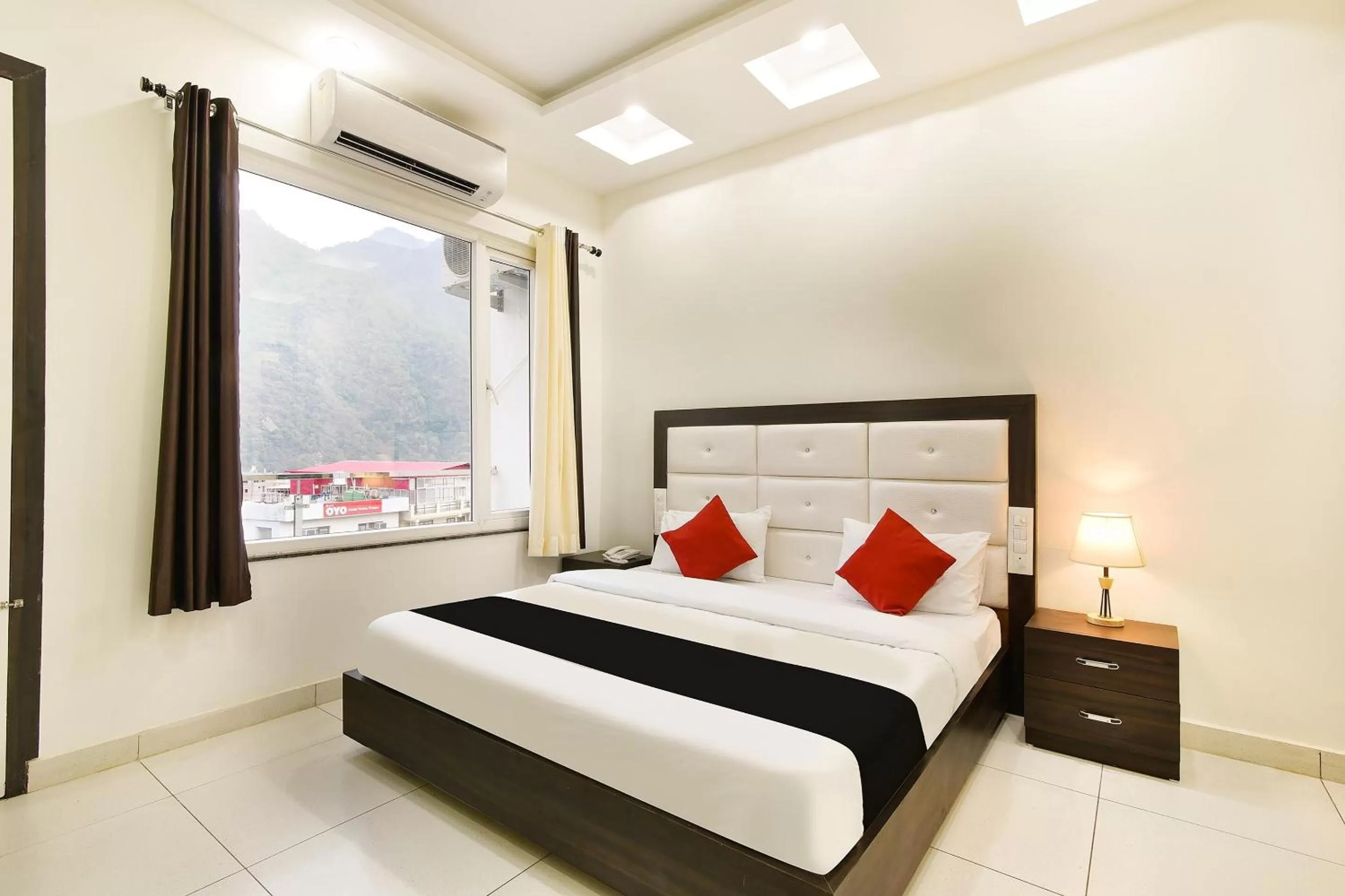 Bedroom, Bed in Capital O Yogasthali Inn Hotel And Spa