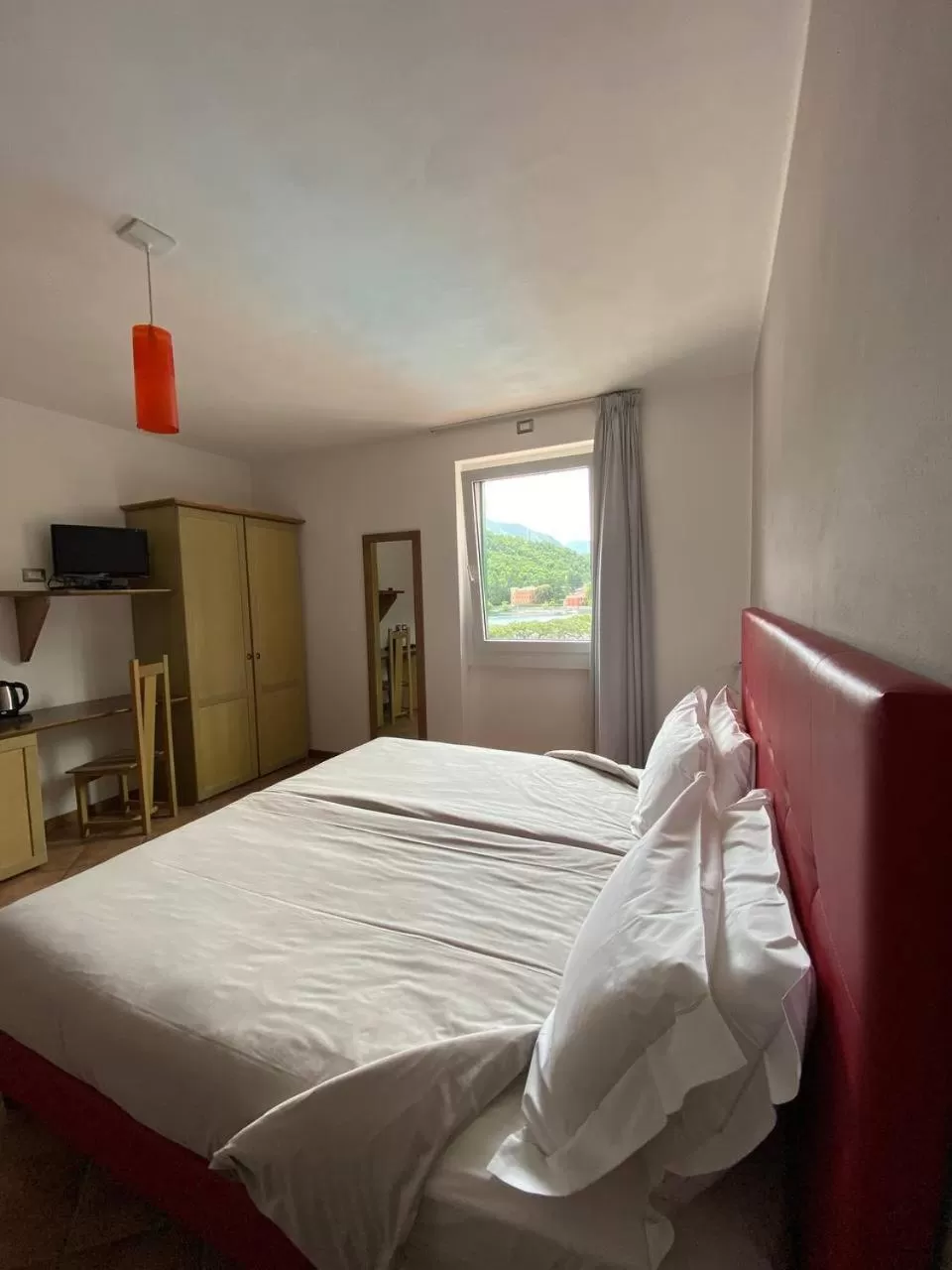 Photo of the whole room, Bed in Hotel Lenno