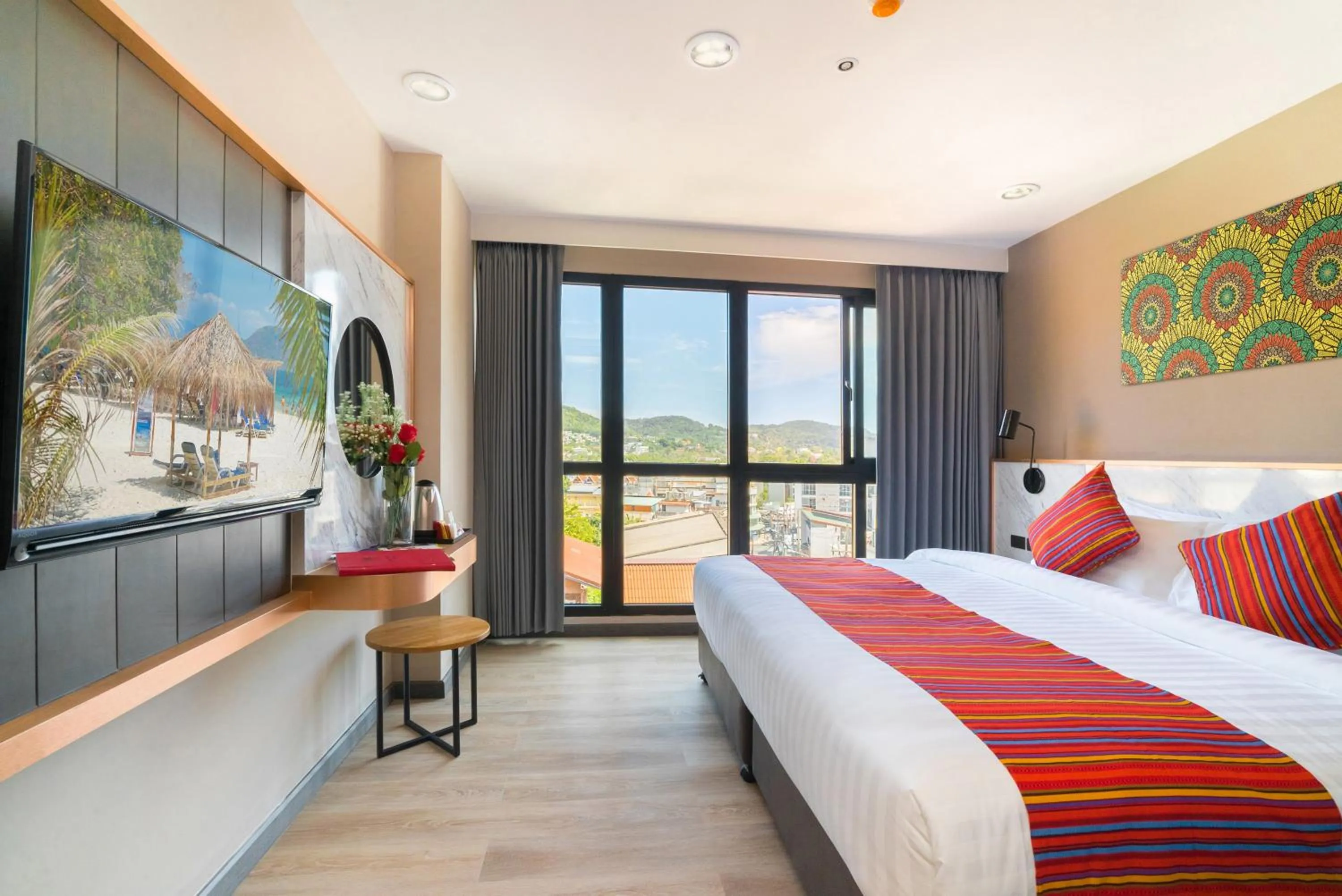 Bed in KK Karon Kata Boutique Hotel