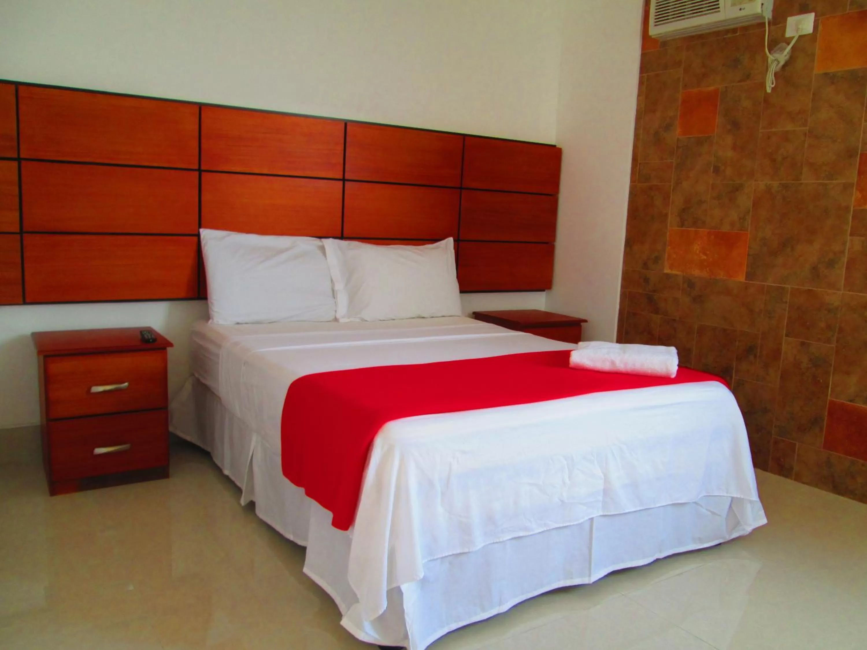 Photo of the whole room, Bed in Hotel Apart Guayaquil Aeropuerto