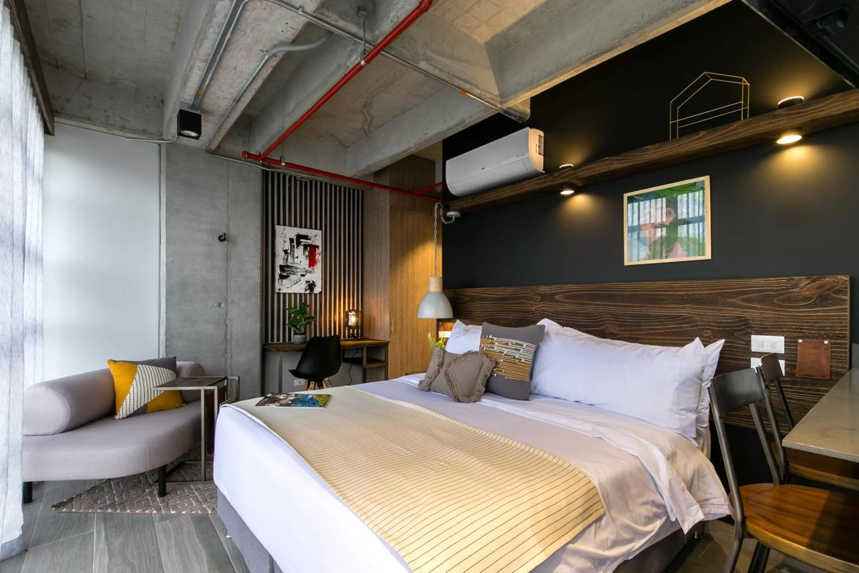 Bed in Factory Lofts Hotel