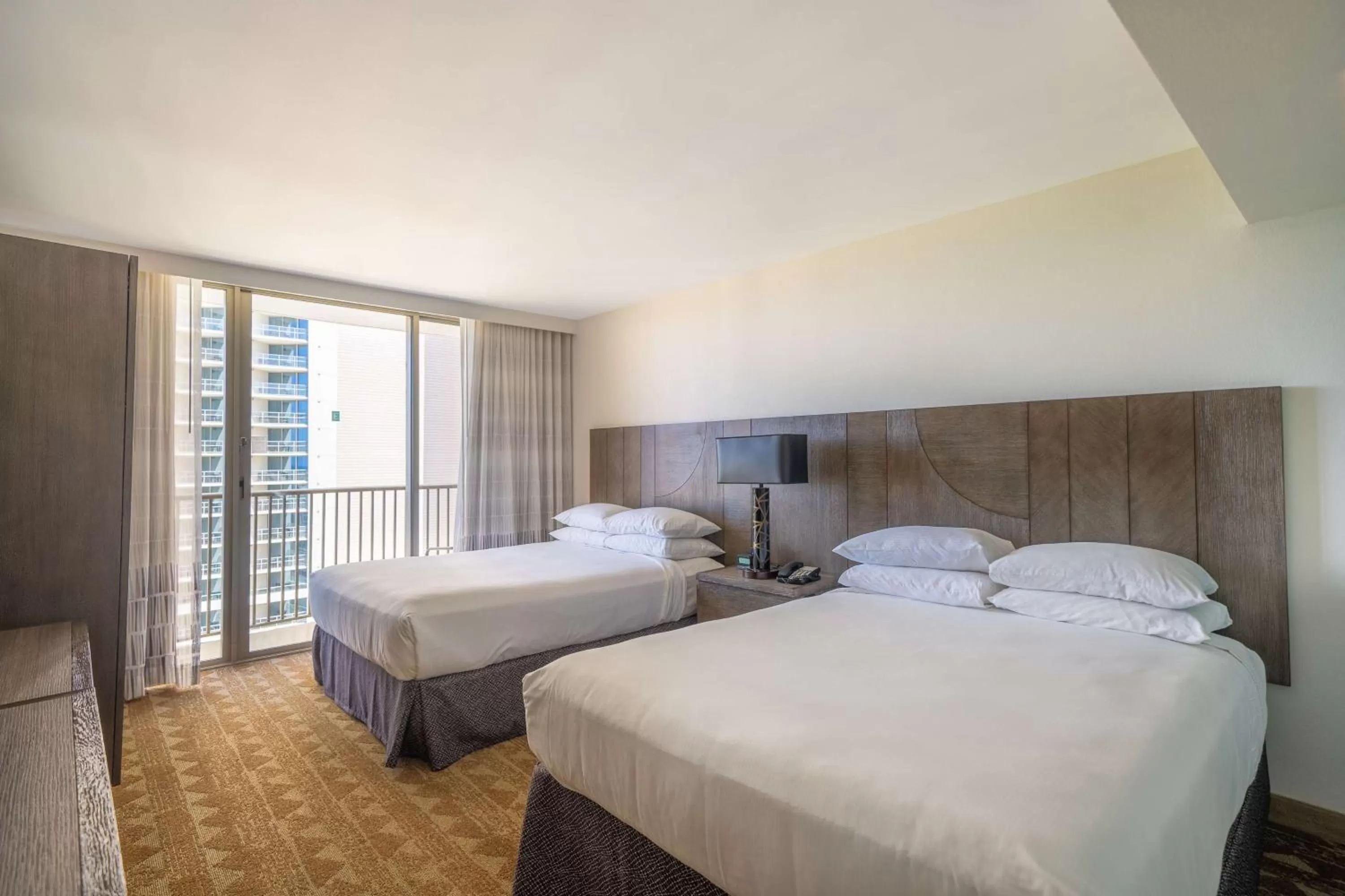 Bed in Embassy Suites by Hilton Waikiki Beach Walk