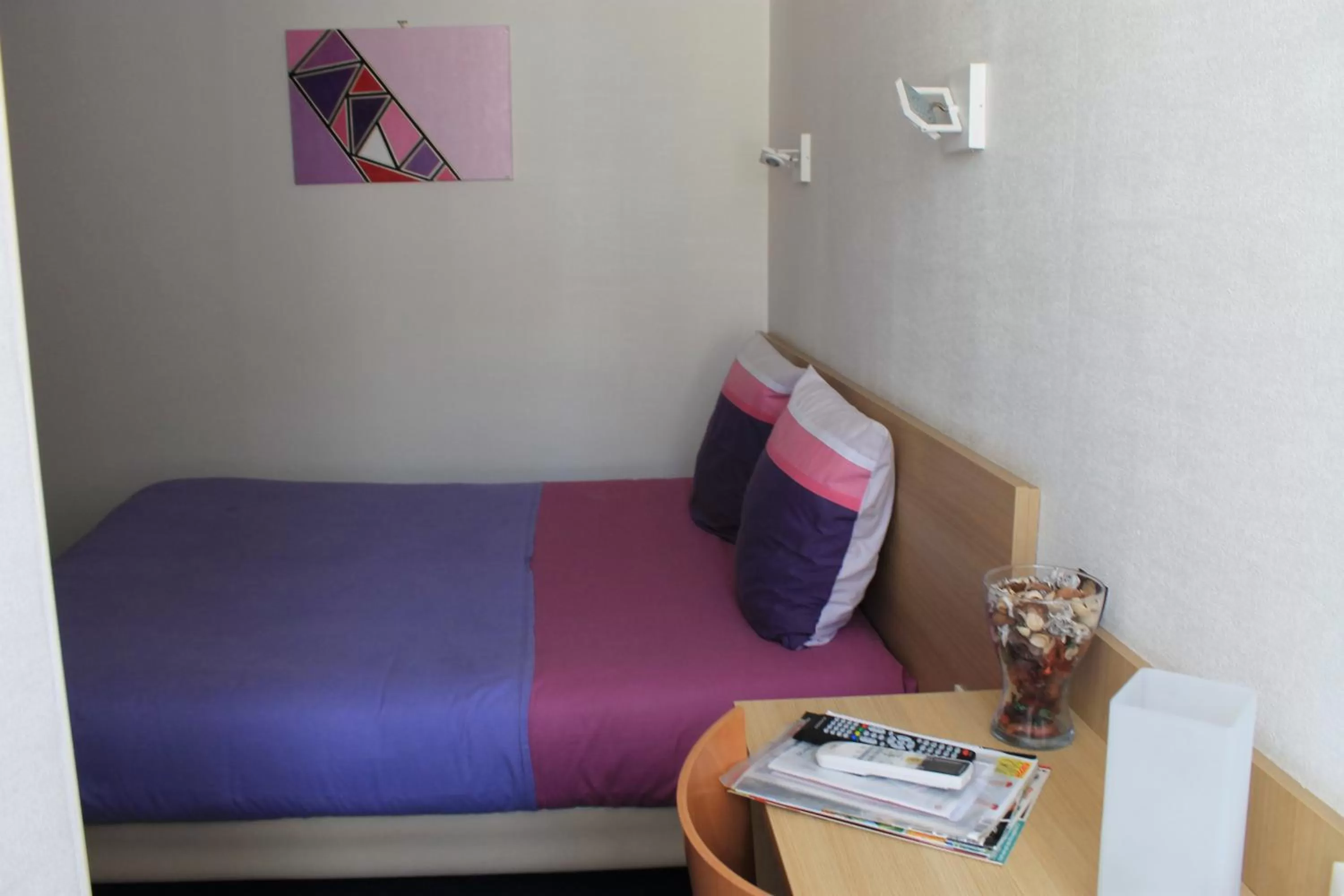 Bed in Hôtel du lion d'or