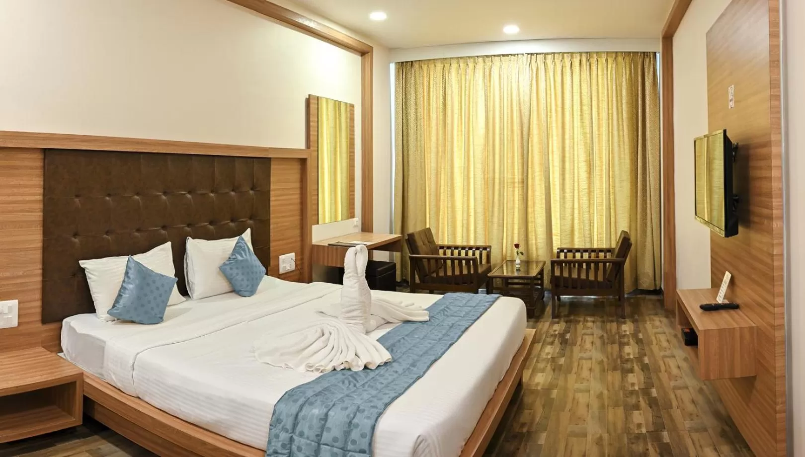 Bed in Hotel Laxmi Empire