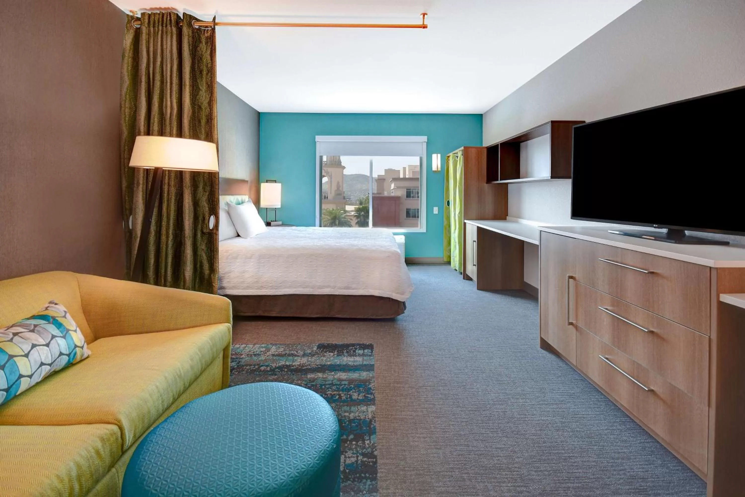 Living room, Bed in Home2 Suites By Hilton Tucson Downtown