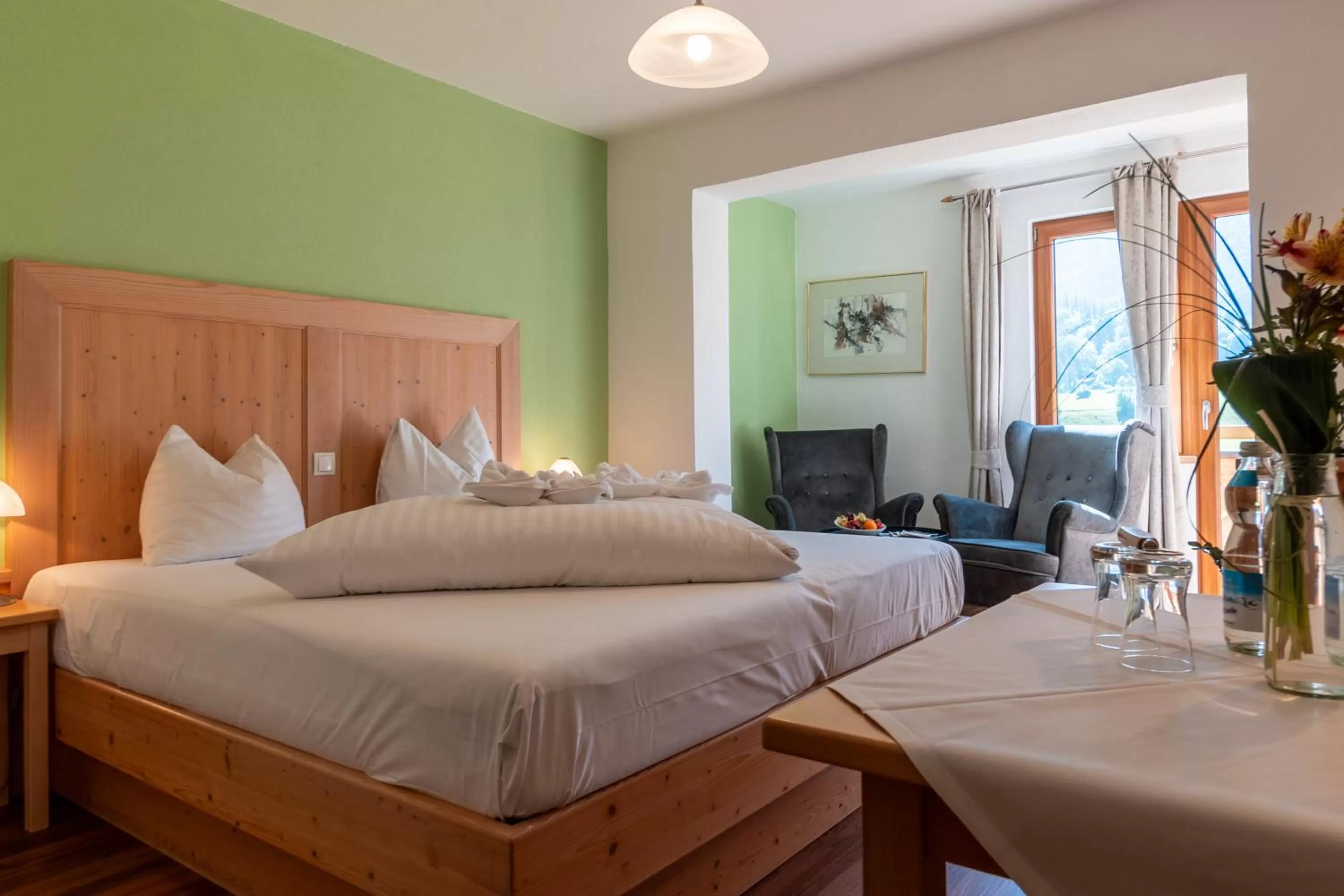 Living room, Bed in dasKAISER - Dein Gartenhotel in Tirol