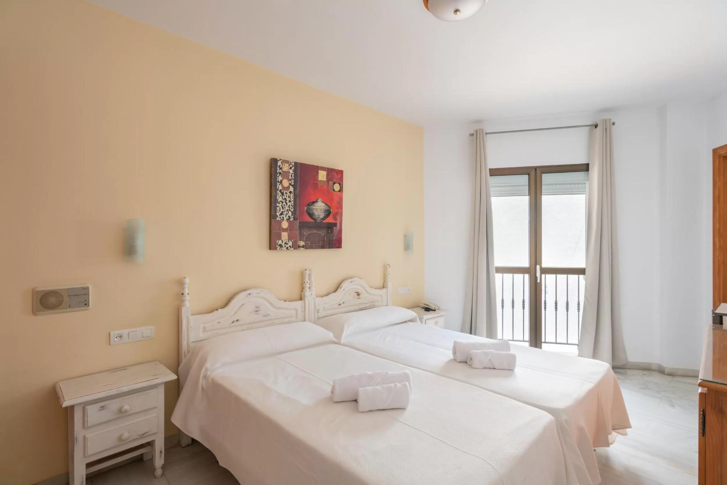 Bed in Apartahotel Playamaro by Dorobe