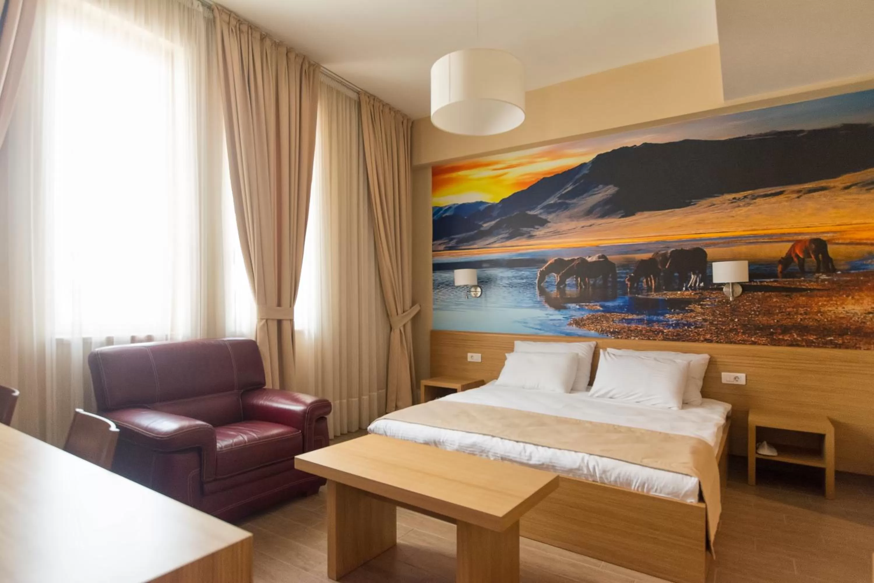 Seating area, Bed in Hotel Lirak