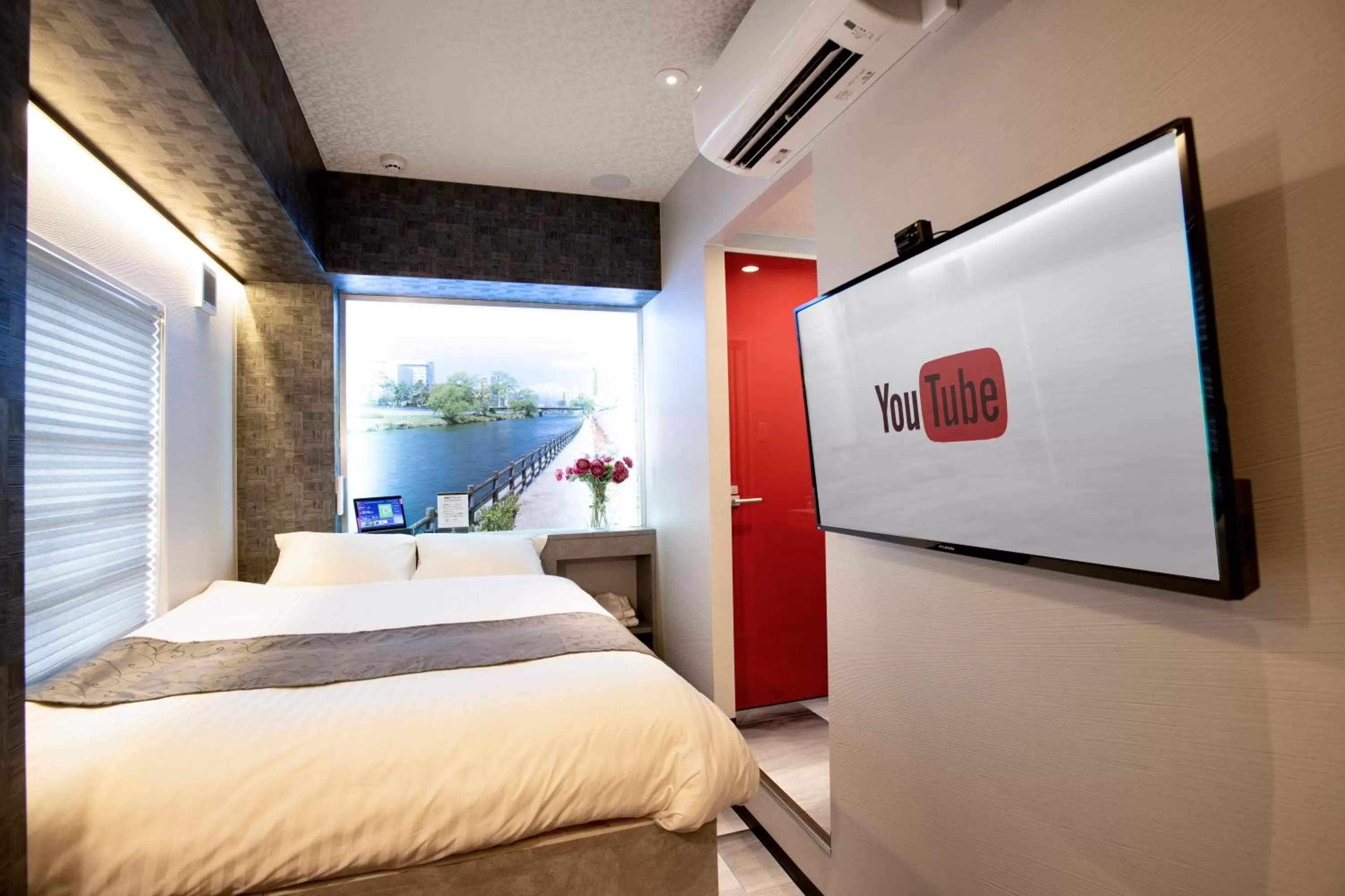 Photo of the whole room, Bed in Pinpon Hotel Hiroshima