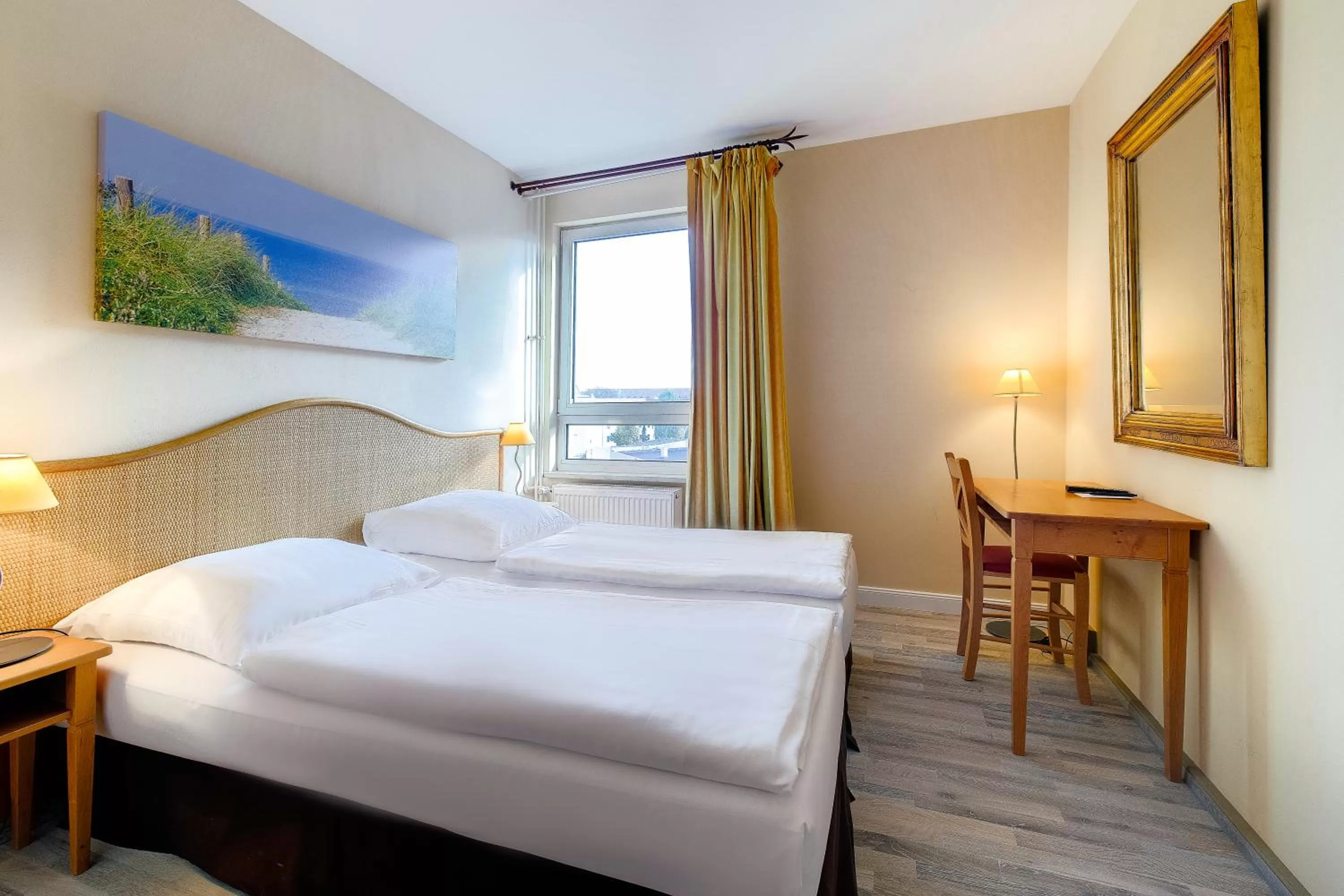 Photo of the whole room, Bed in Hotel Leipzig City Nord by Campanile