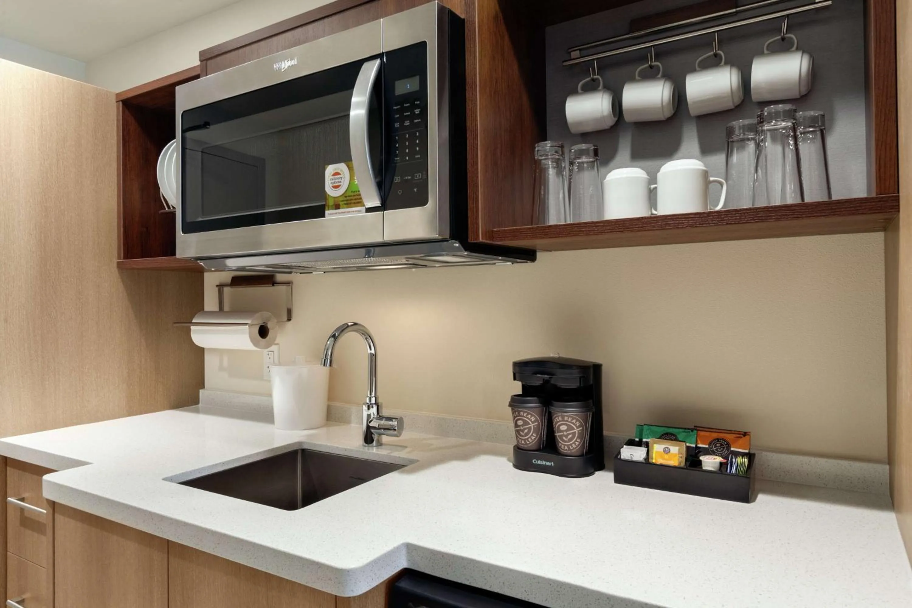 Kitchen or kitchenette in Home2 Suites By Hilton Sarasota Bradenton Airport