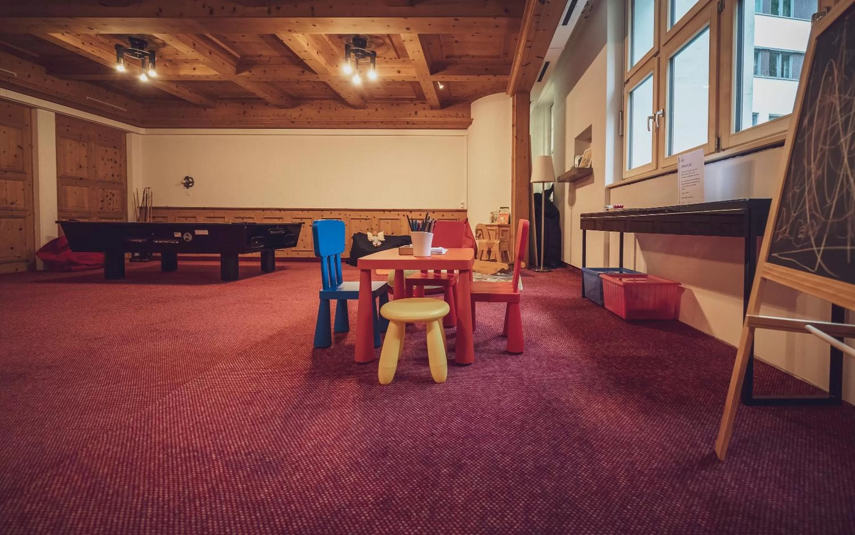 Communal lounge/ TV room in Hotel Strela by Mountain Hotels