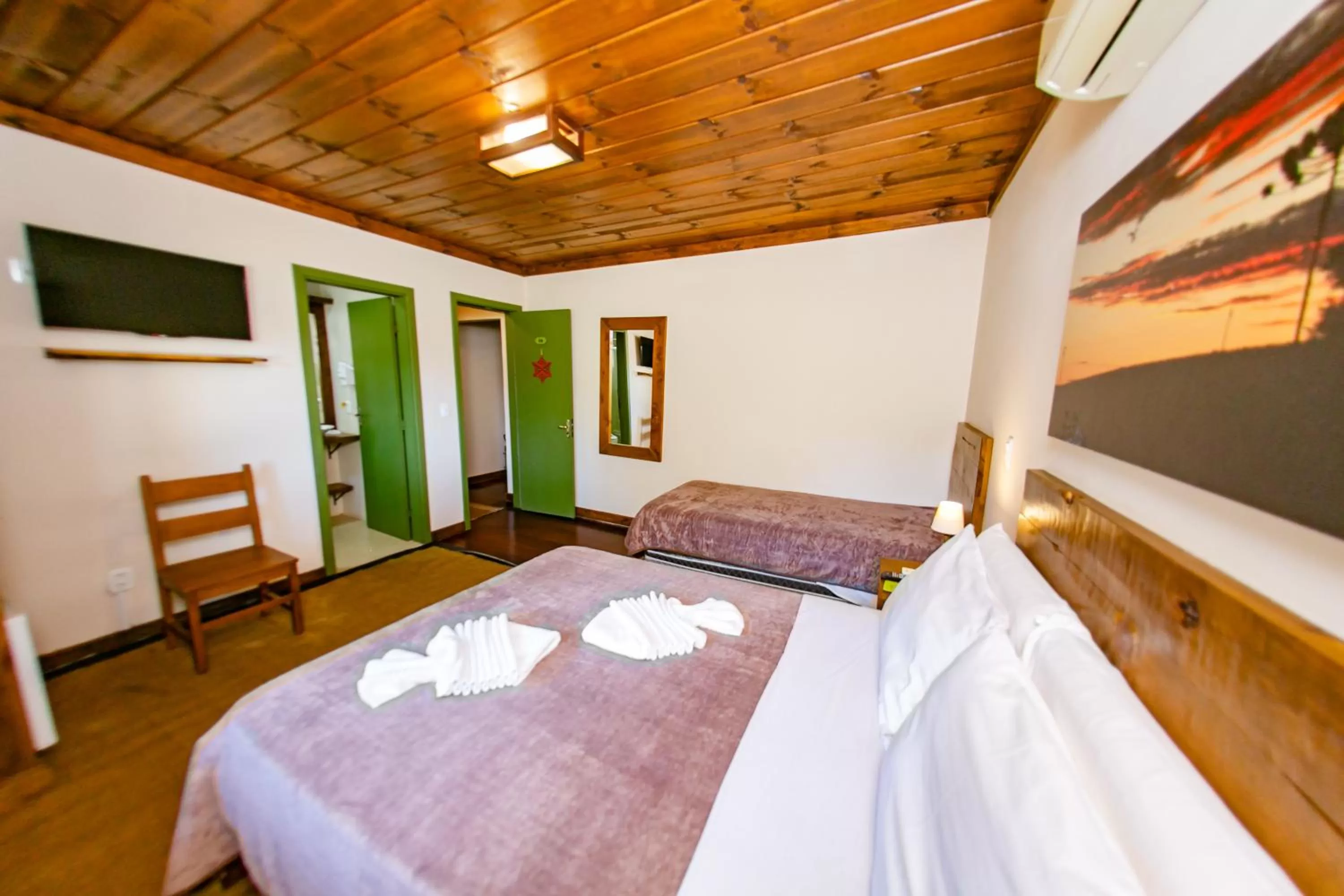 Bed in Pousada Charm Canela