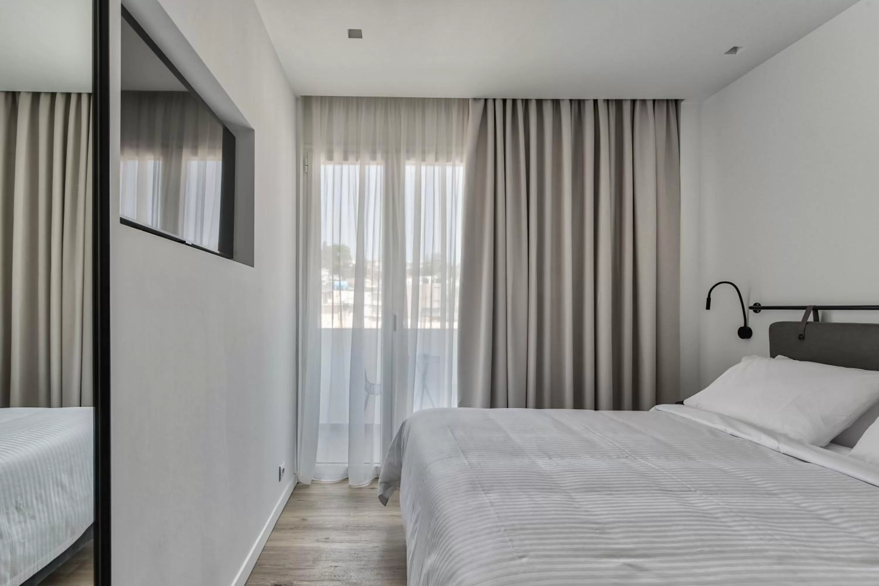 TV and multimedia, Bed in Bitzaro Boutique Hotel