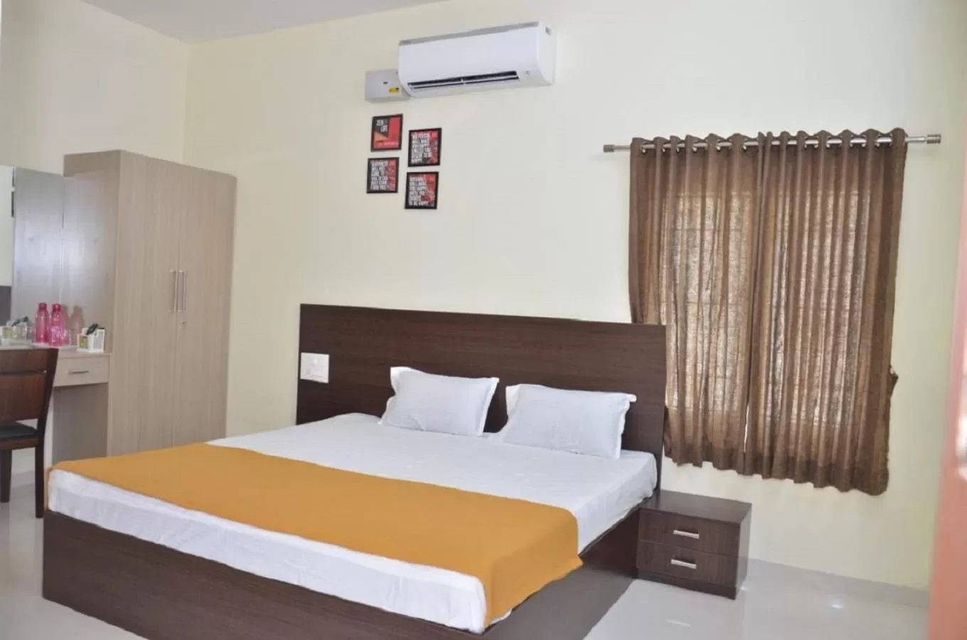 Bed in THE SURRYA MAX RESIDENCY