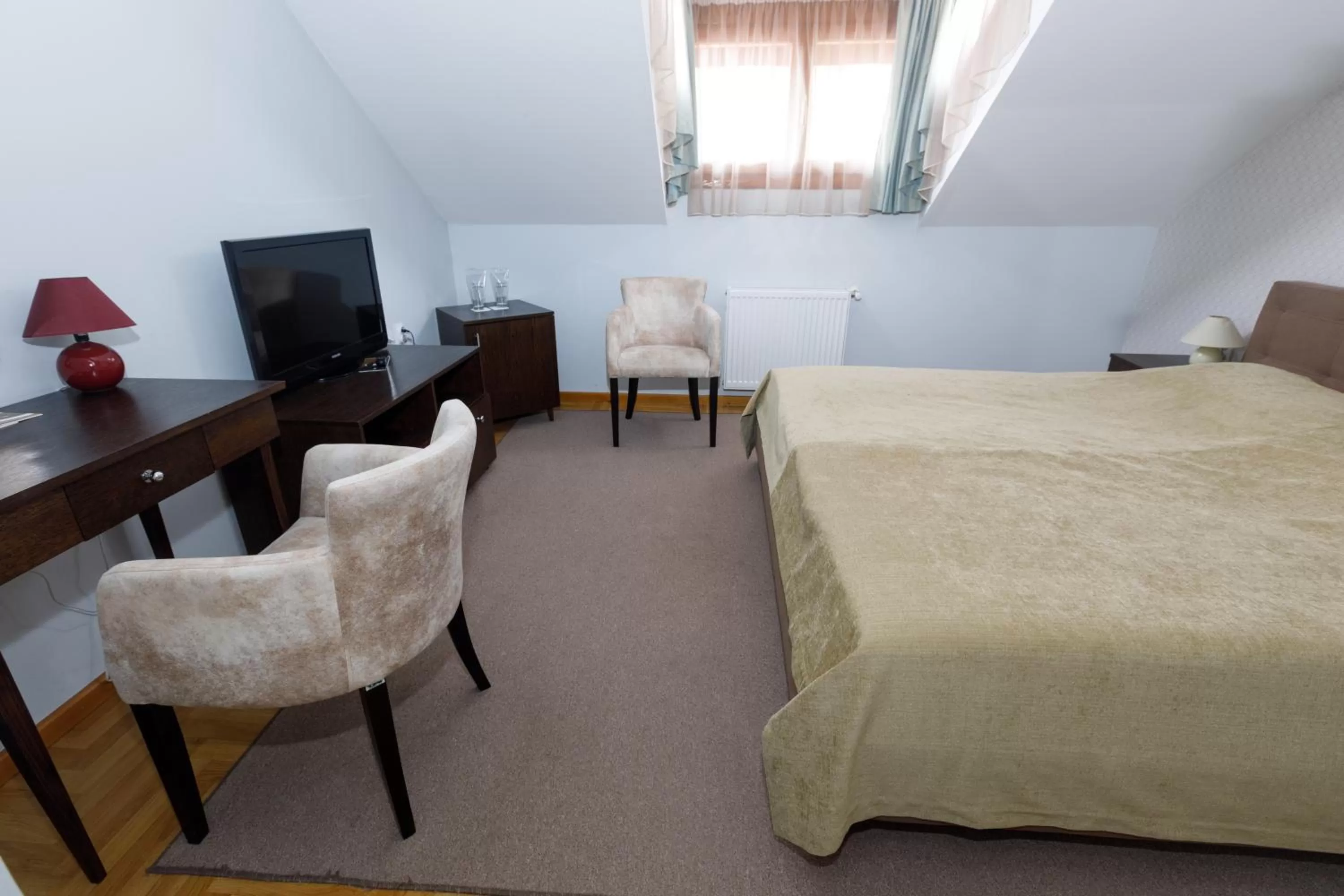 Decorative detail, Bed in Art Garni Hotel