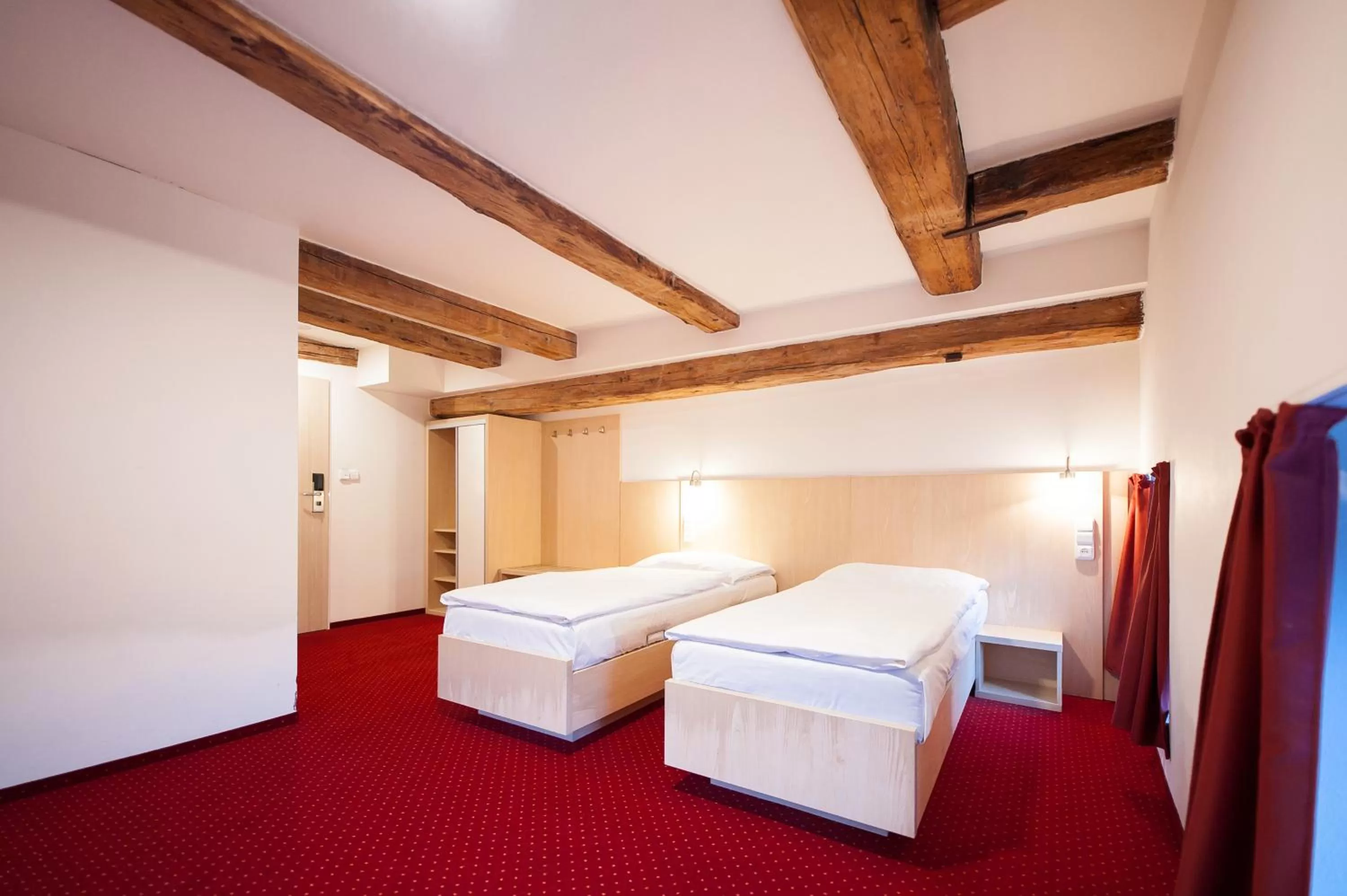 Bed in Hotel Pivovar