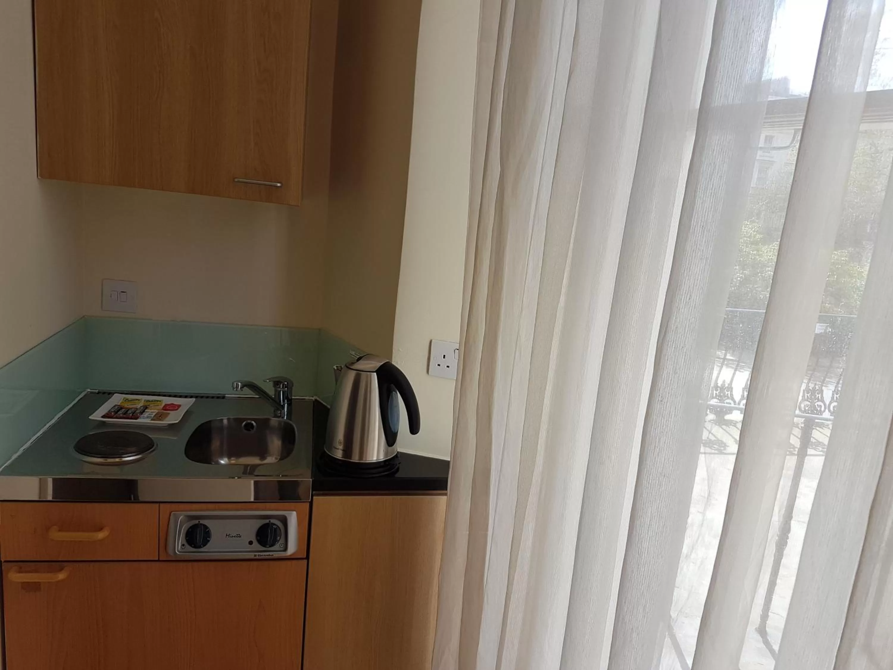 Kitchen or kitchenette in The Royale Chulan Hyde Park Hotel