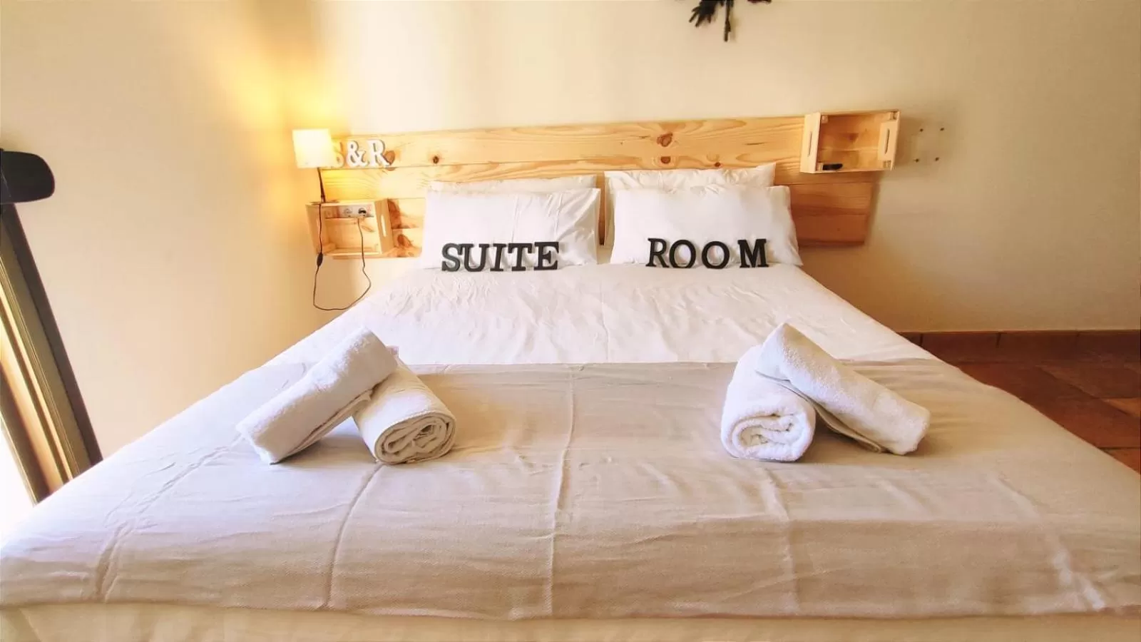 Bed in El Bosque Suites&Room