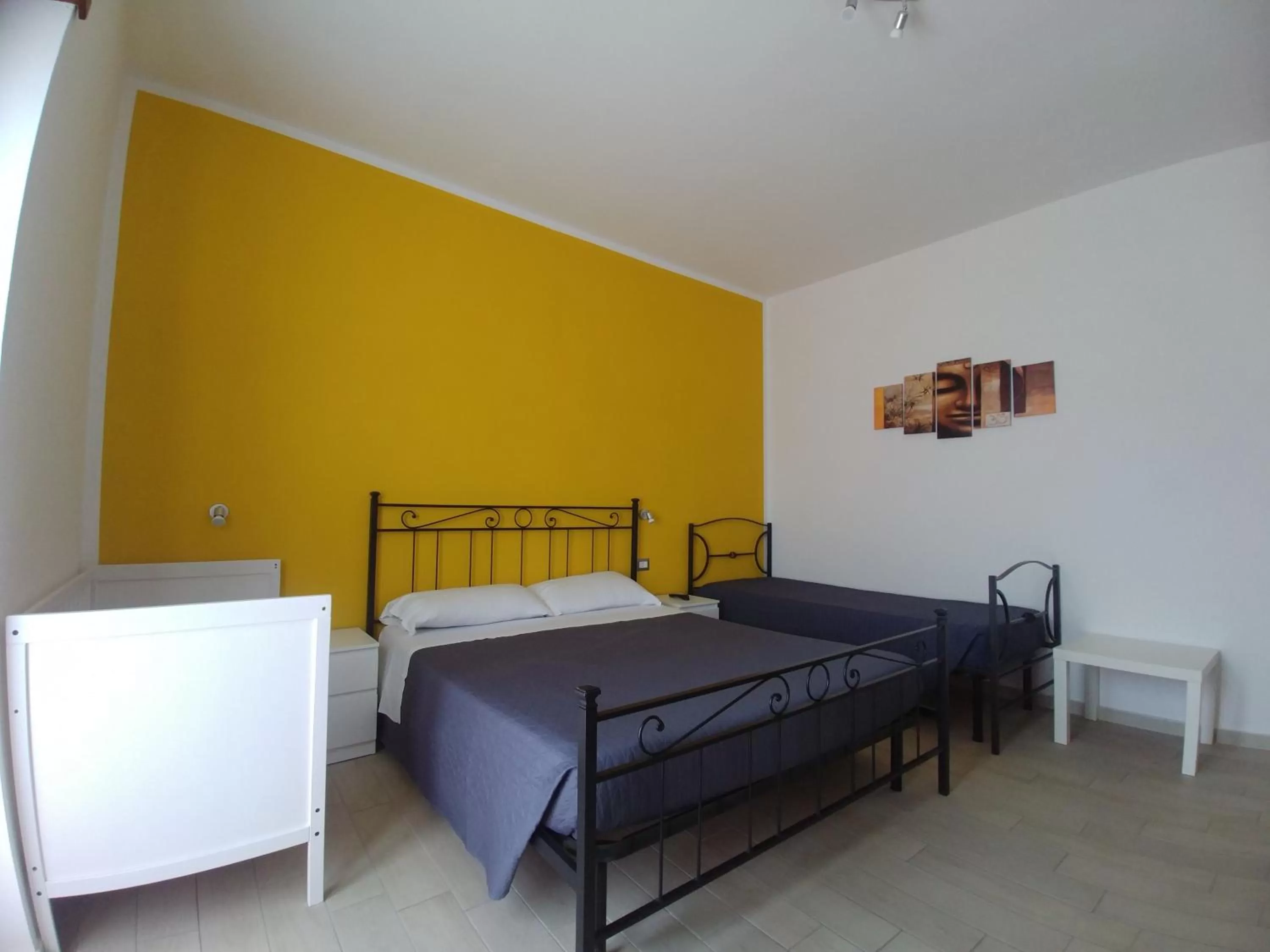 Bed in Bonsai Bed & Breakfast