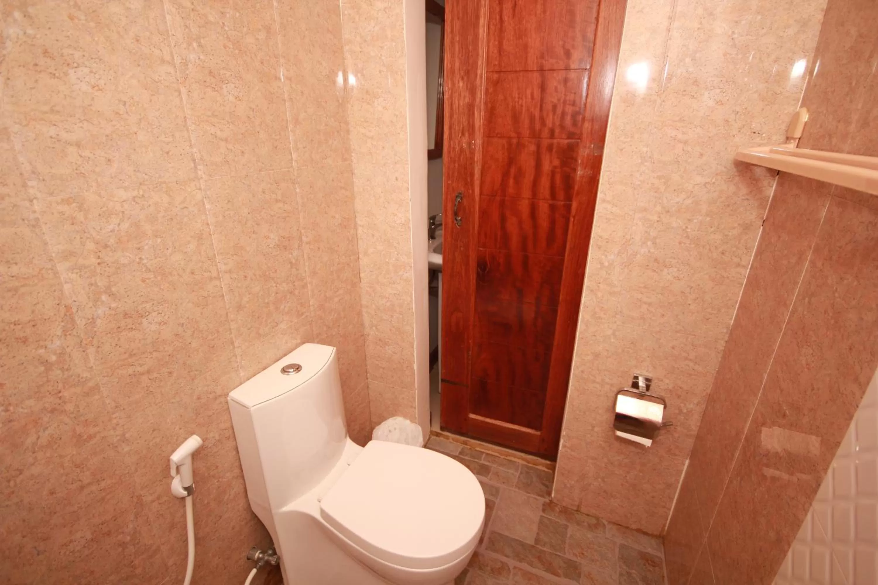 Toilet in El Nido Royal Palm Inn