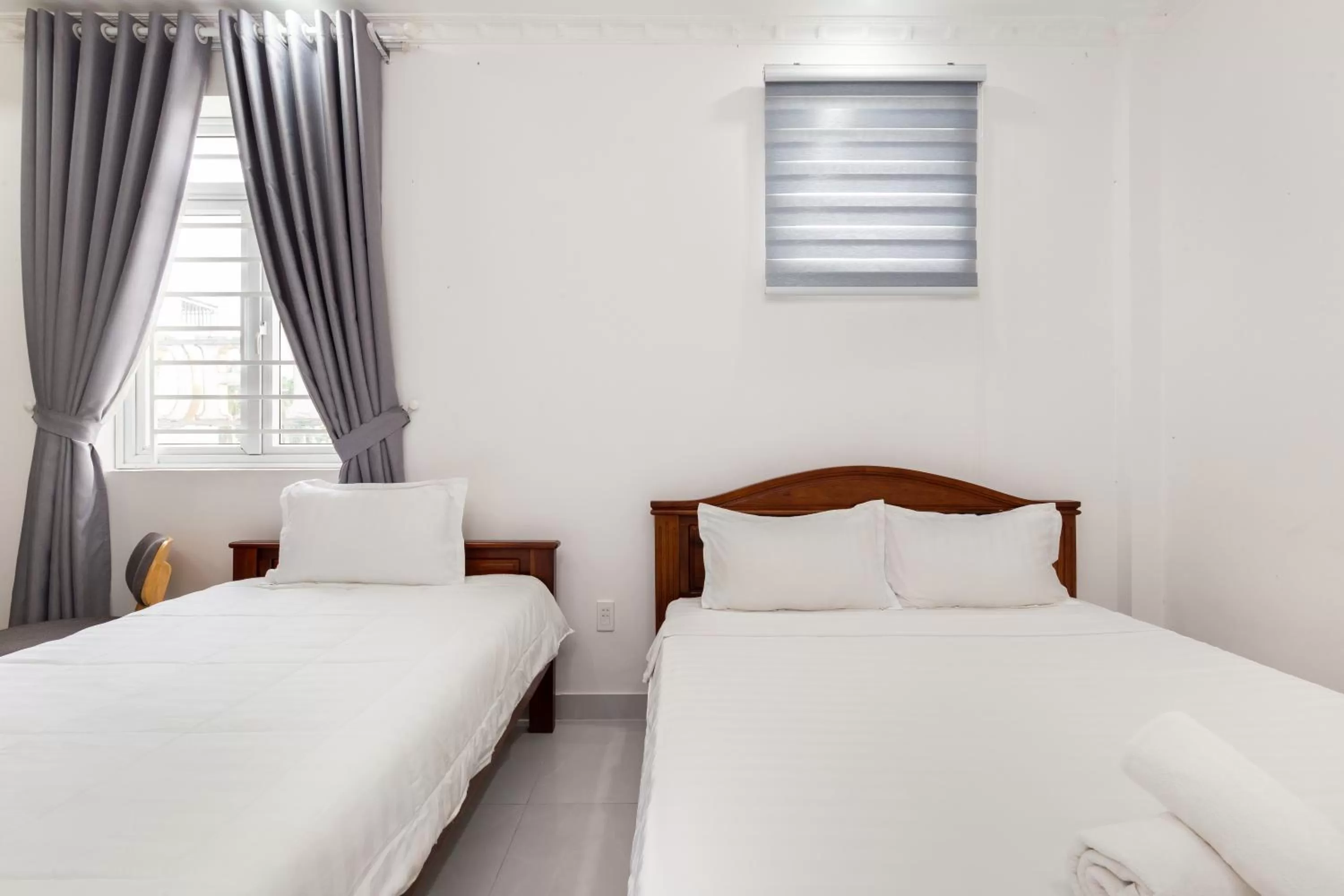 Bed in Luxury Vườn Lài Hotel