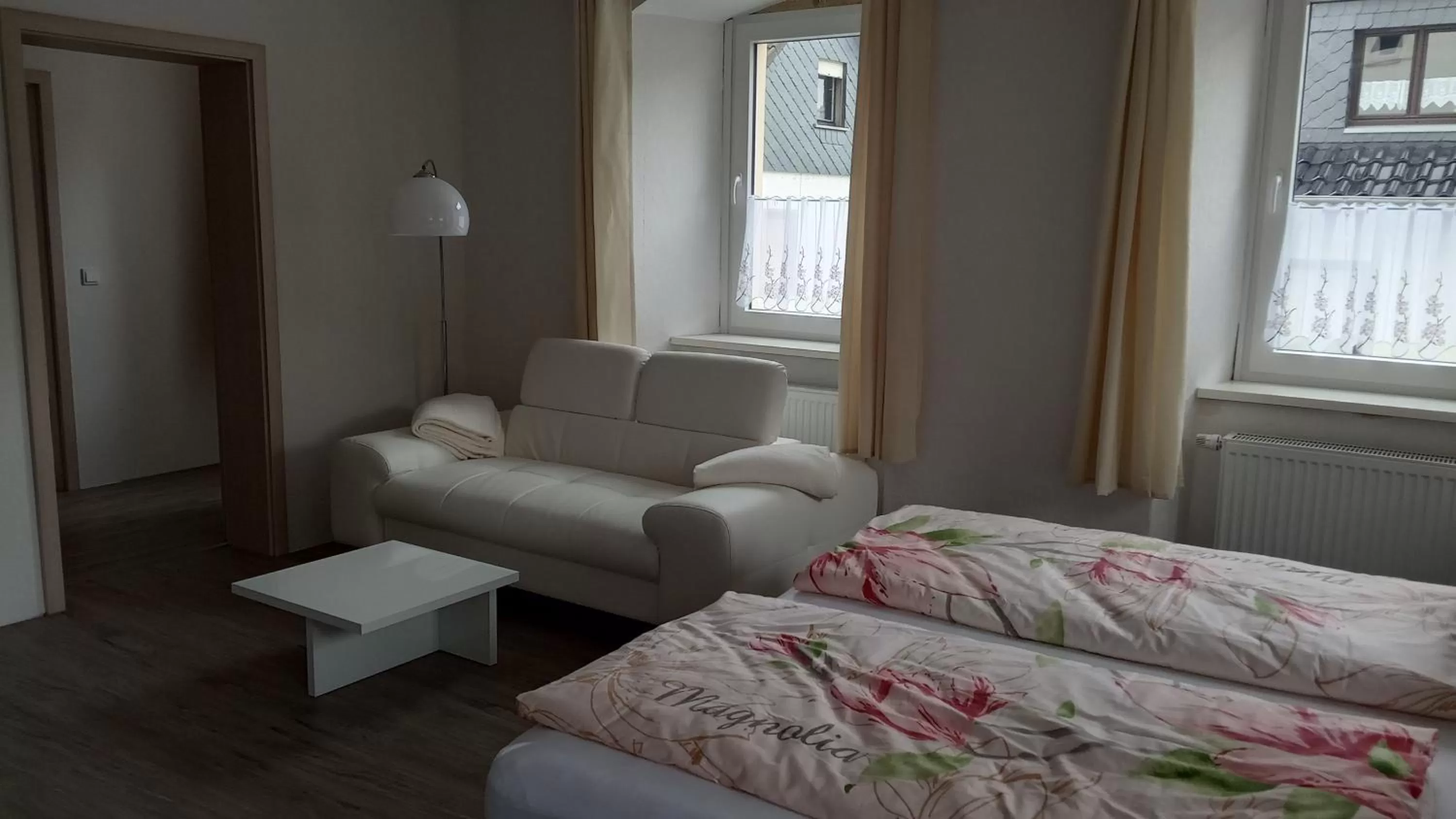 Seating area, Bed in Gästehaus - Café Frank