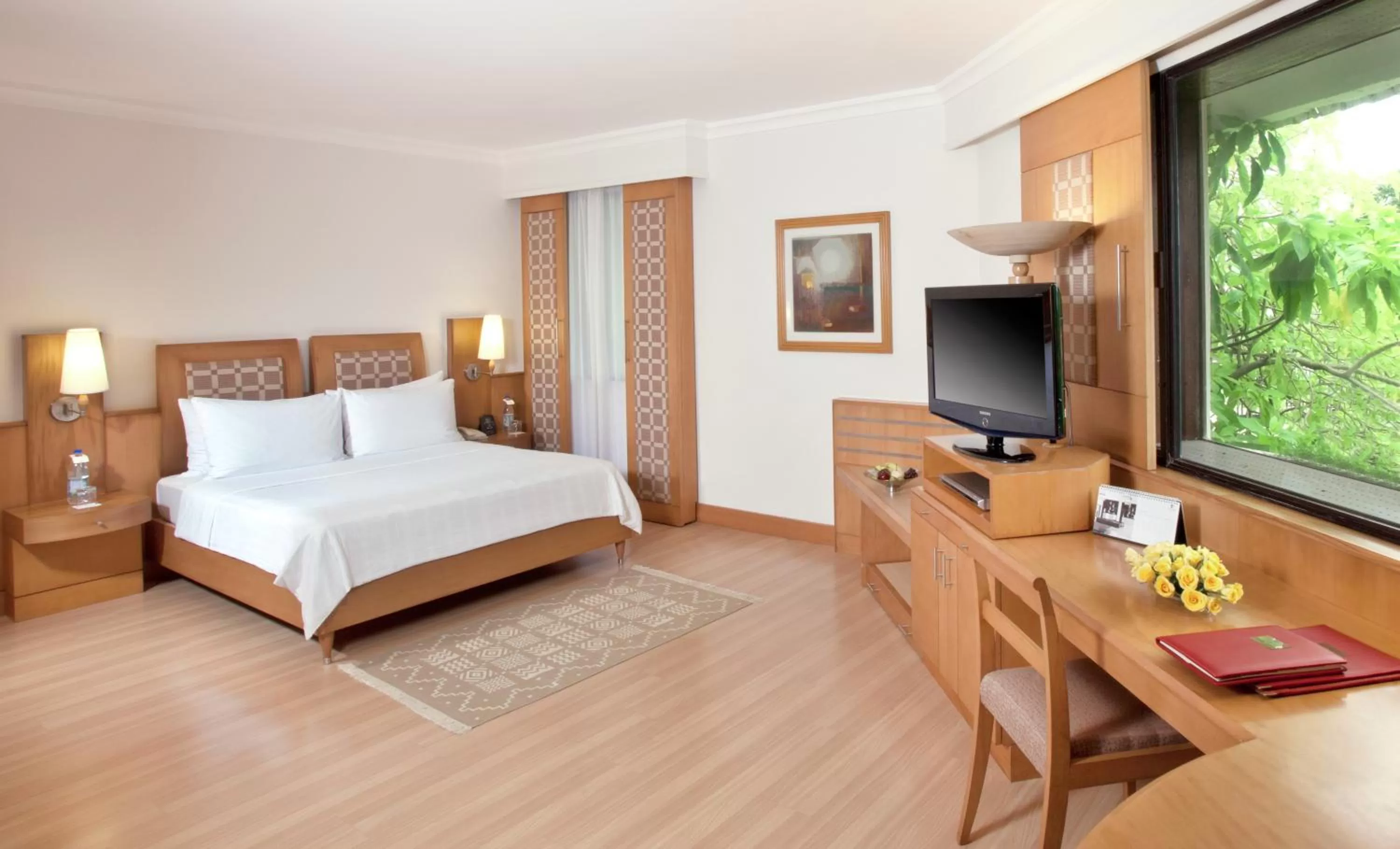 Photo of the whole room, Bed in Trident Chennai